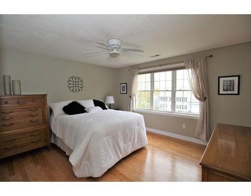 6 Wagon Wheel Road North Attleboro, MA 02760 - Photo 25 of 30 a bedroom with a bed a dresser and a window