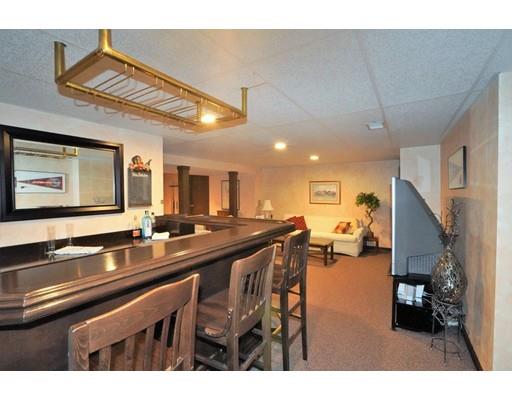 6 Wagon Wheel Road North Attleboro, MA 02760 - Photo 28 of 30 a dining hall with stainless steel appliances a sink dishwasher stove and flat screen tv