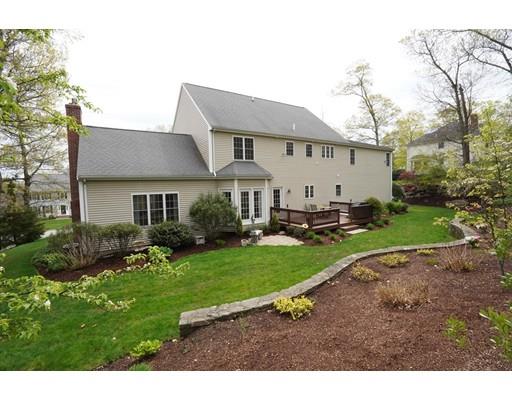 6 Wagon Wheel Road North Attleboro, MA 02760 - Photo 5 of 30 a view of a white house with a yard plants and large tree