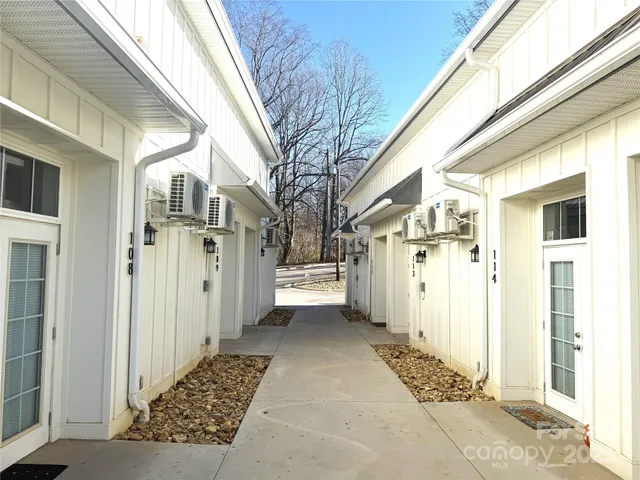 a view of a street with cars