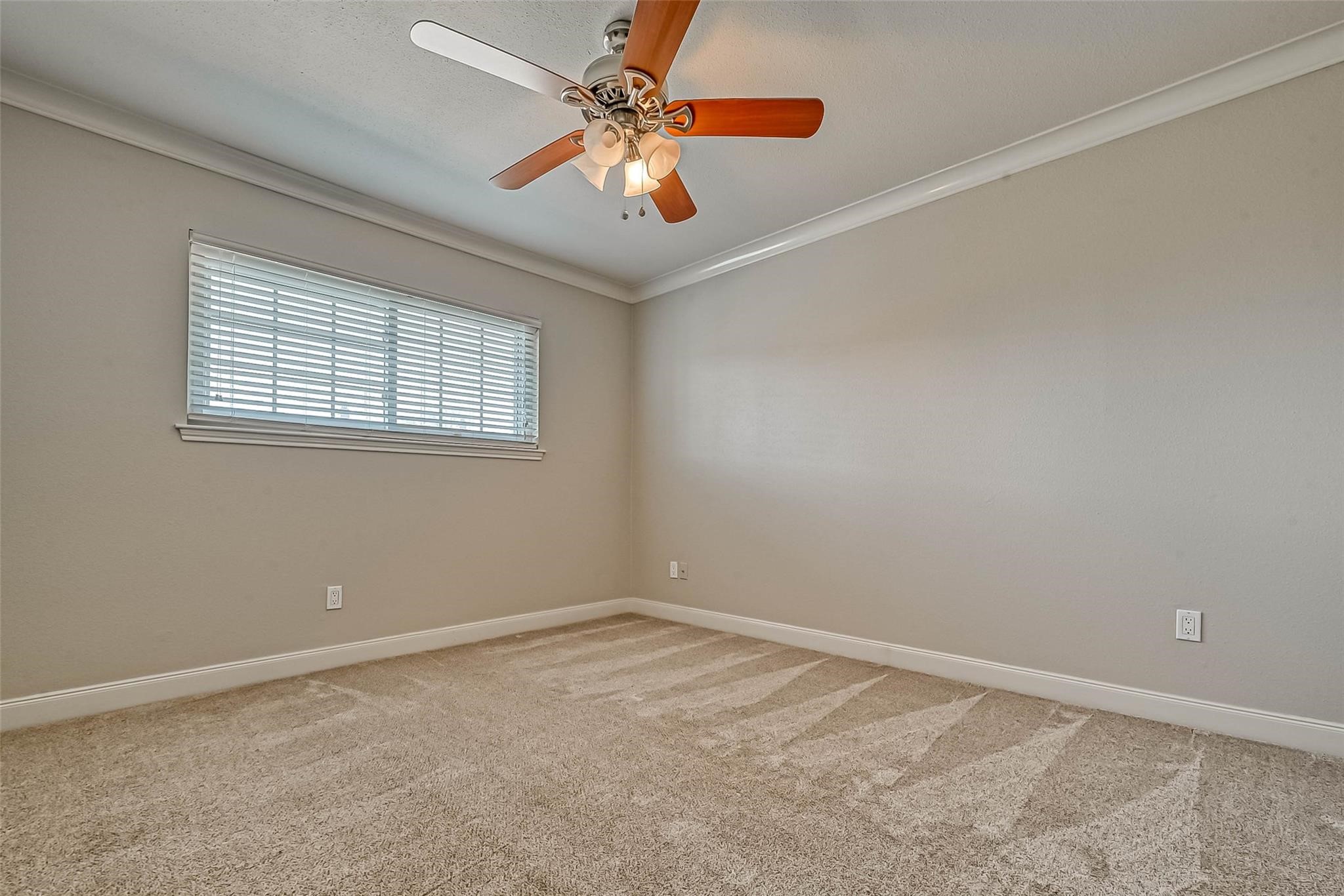 14690 Perthshire Road, Unit A Houston, TX 77079 - Photo 24 of 44 The secondary bedroom is a blank
canvas, waiting for you to transform it
according to your personal preferences.
With ample space and neutral tones, it
provides the perfect foundation for any
design style you envision.