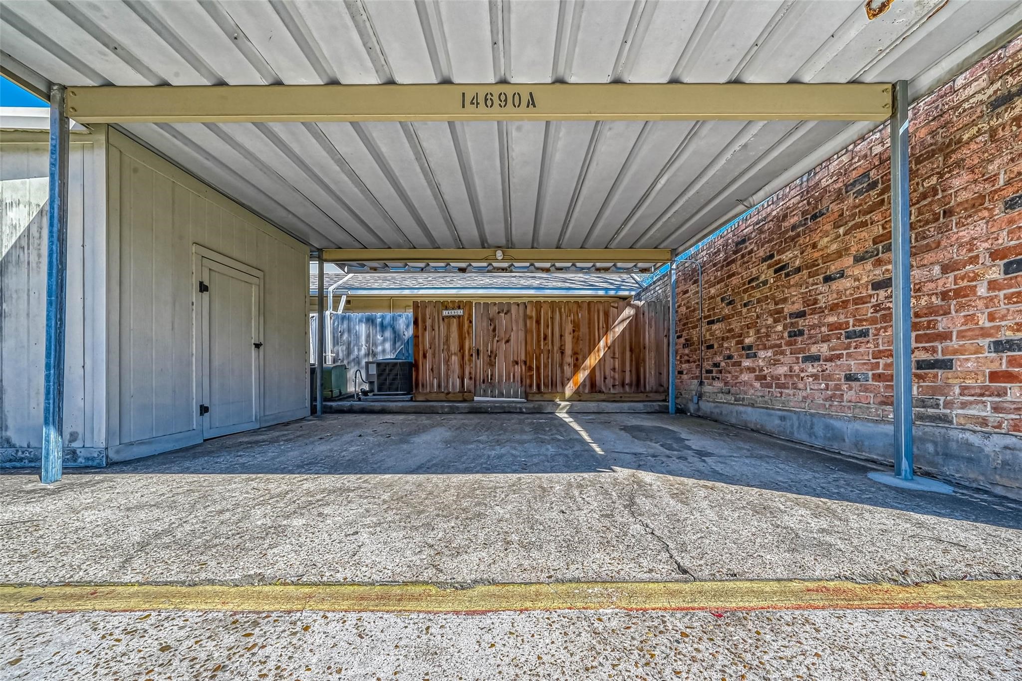 14690 Perthshire Road, Unit A Houston, TX 77079 - Photo 38 of 44 The townhouse includes a convenient
two-car detached carport, providing
ample space for your vehicles.
