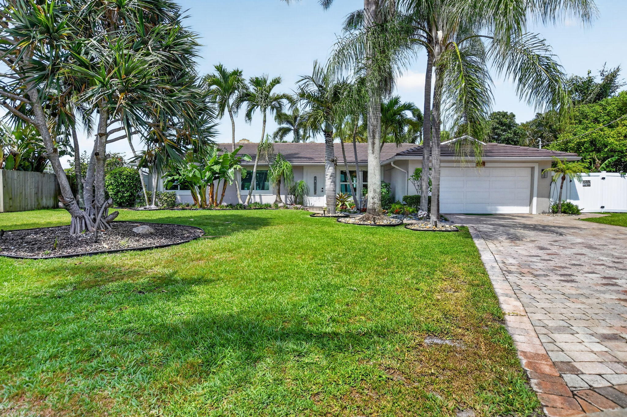 6951 Northeast 7th Avenue Boca Raton, FL 33487 - Photo 2 of 60 2-web-or-mls-DSC_1866