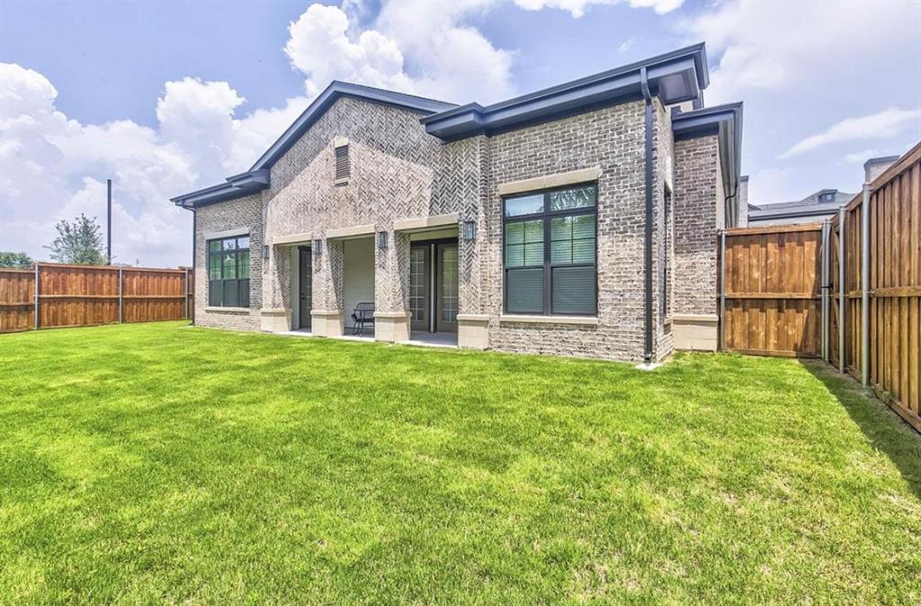 12001 Inwood Road, Unit 3701 Dallas, TX 75244 - Photo 14 of 15 Back of house with a yard