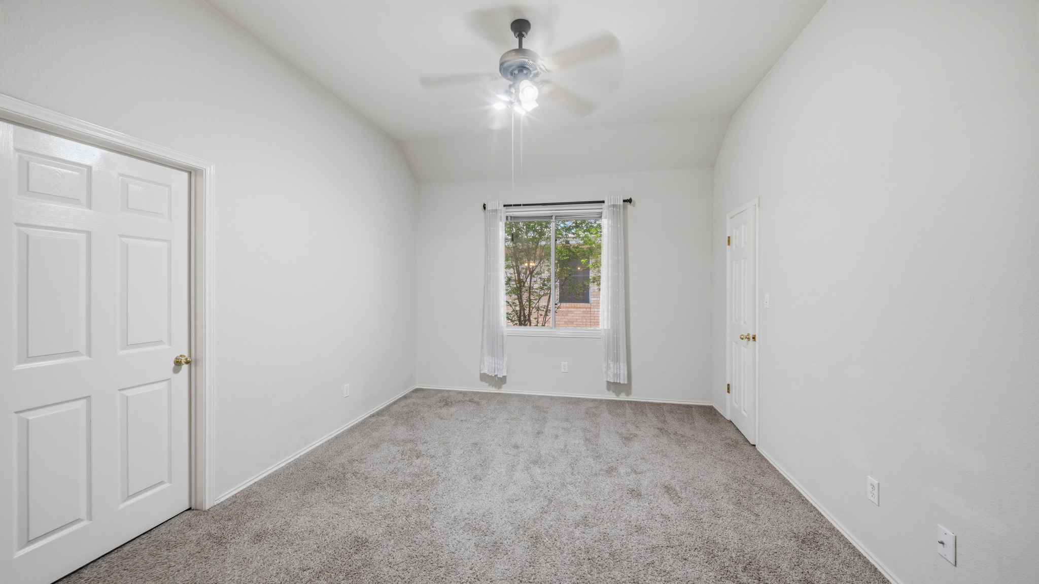 1108 Antelope Ridge Cedar Park, TX 78613 - Photo 12 of 27 A well-lit bedroom features plush carpeting and a large window for natural light.