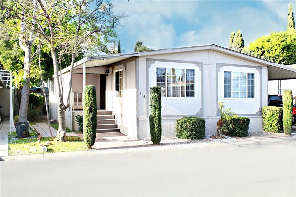 front view of a house with a small yard