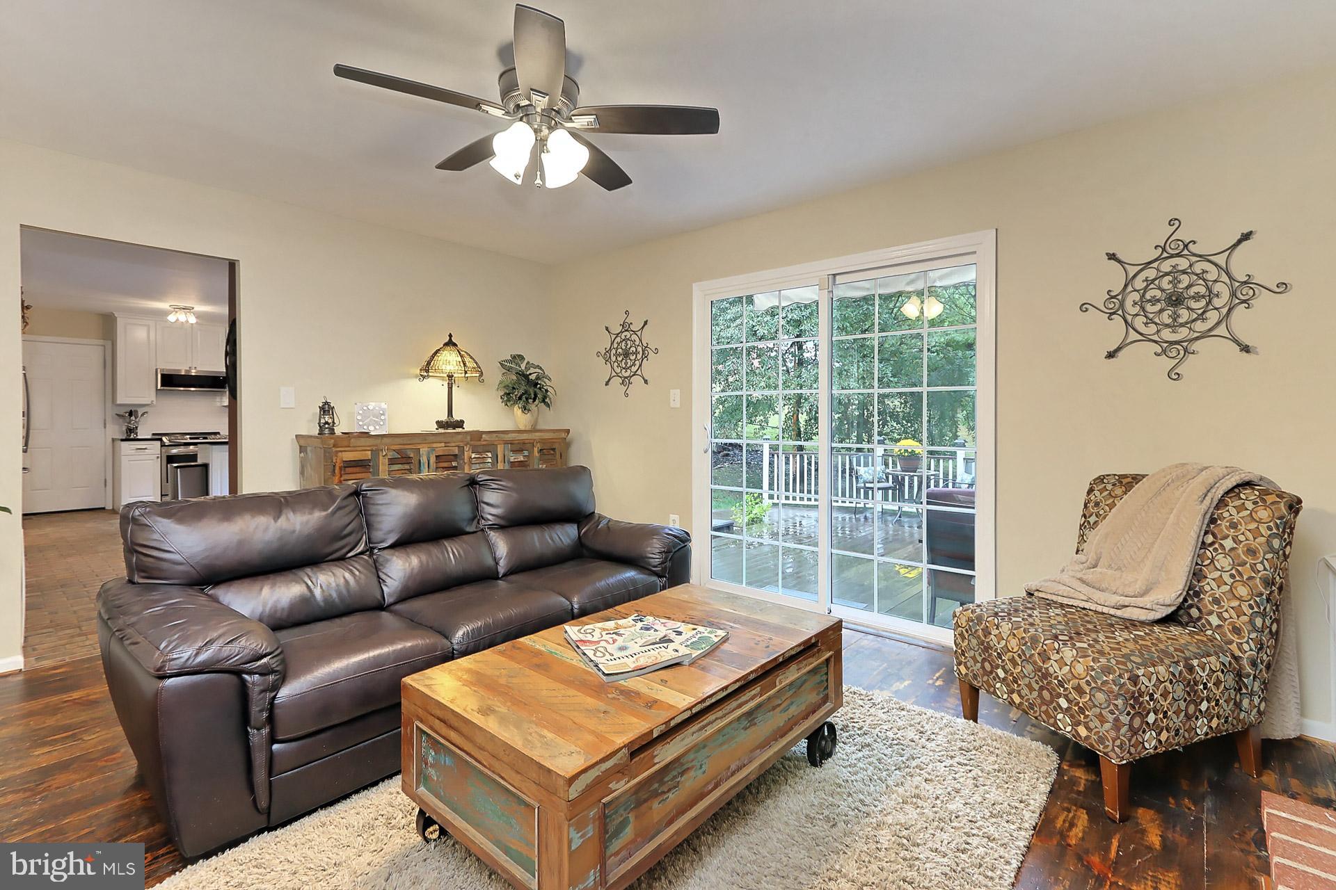 8108 Viola Street Springfield, VA 22152 - Photo 16 of 61 Wide plank wood floors, ceil fan & slider to deck