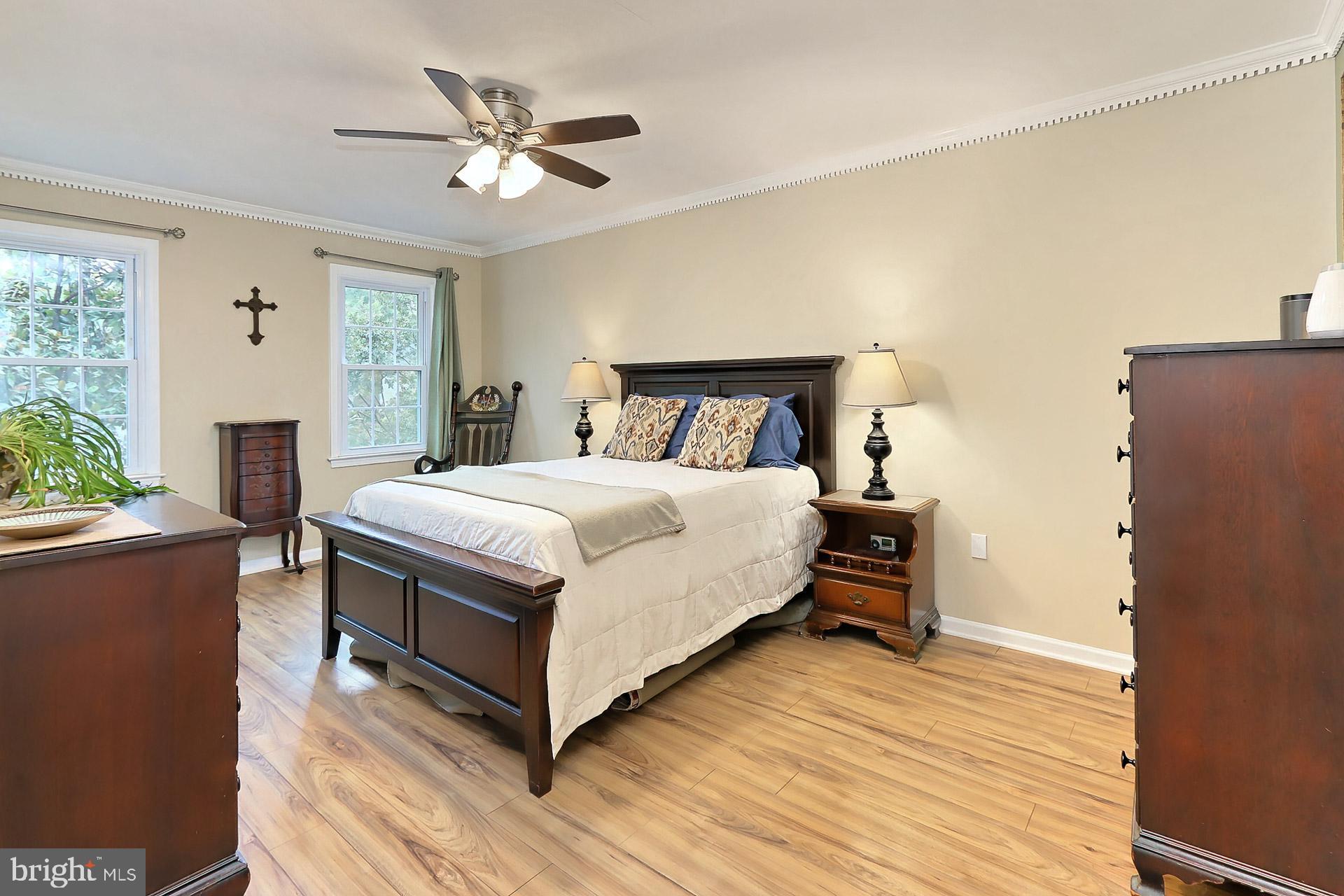 8108 Viola Street Springfield, VA 22152 - Photo 19 of 61 Large primary bedroom has laminate flooring