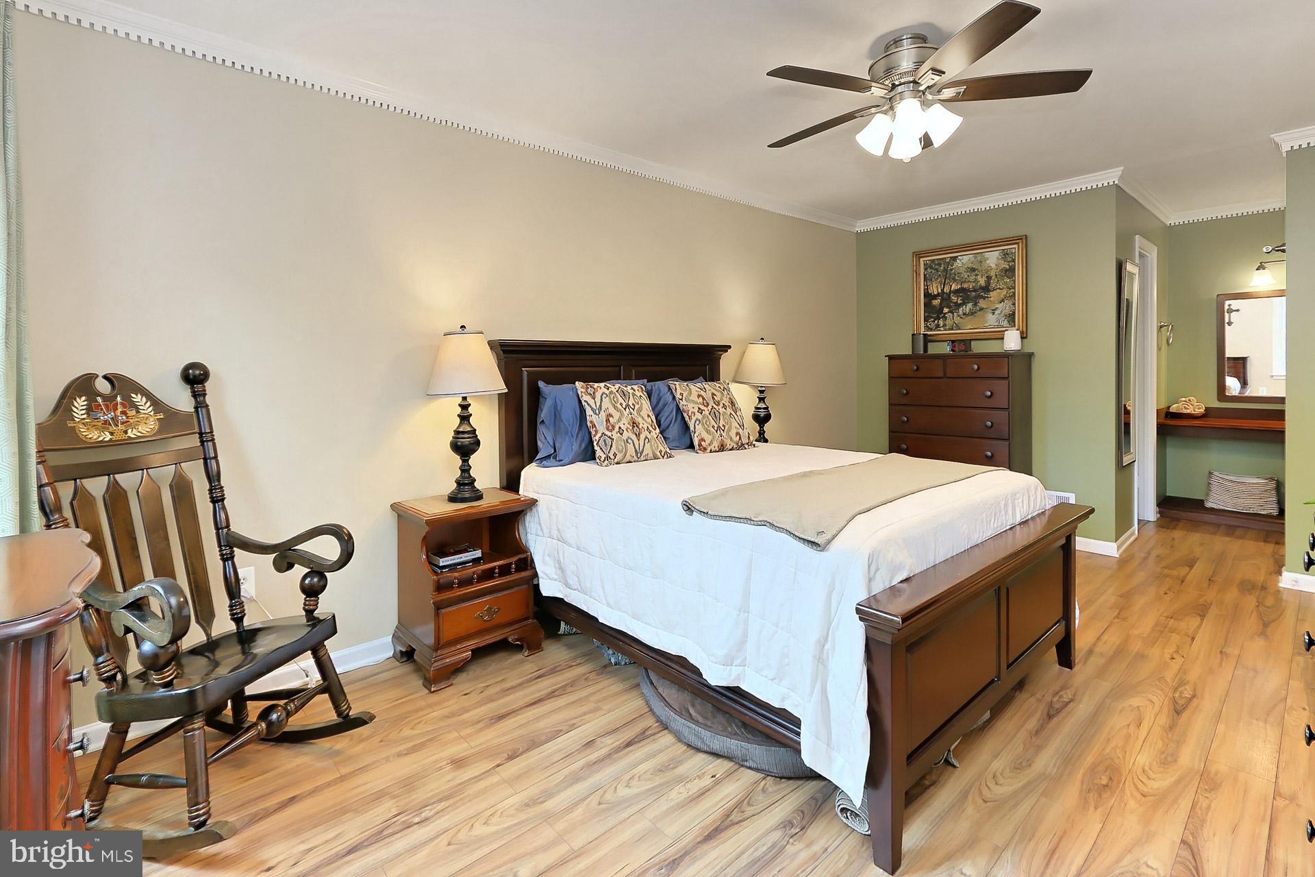 8108 Viola Street Springfield, VA 22152 - Photo 20 of 61 Lighted ceiling fan and dentil crown molding