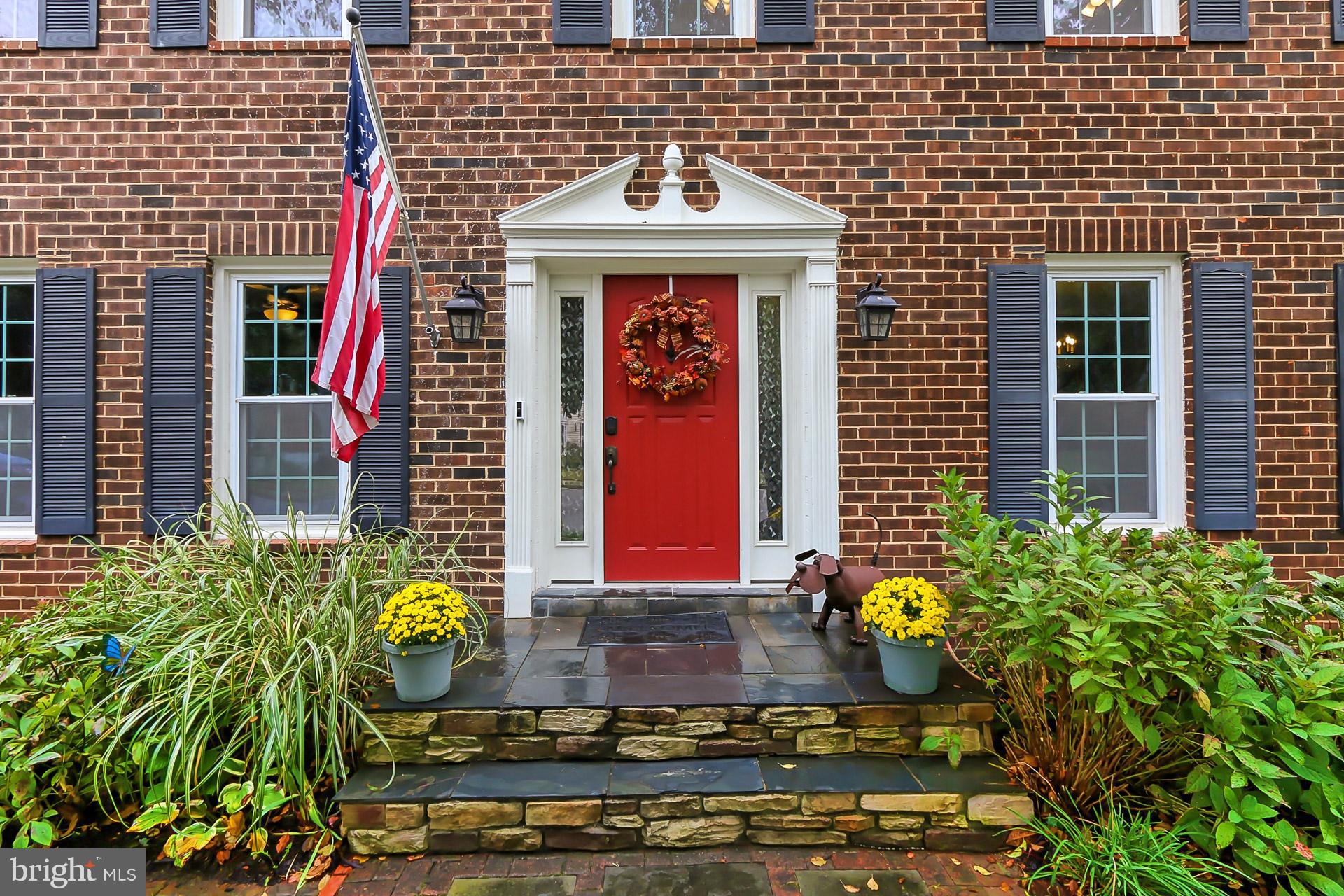 8108 Viola Street Springfield, VA 22152 - Photo 2 of 61 Stone accents on the stoop and framing the garage