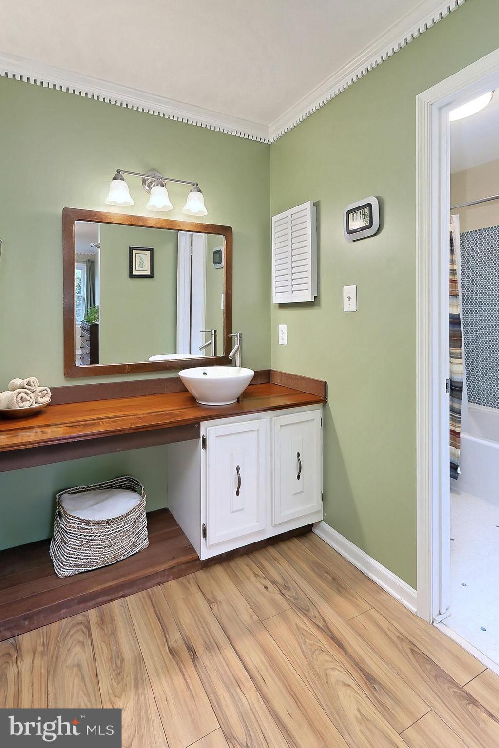 8108 Viola Street Springfield, VA 22152 - Photo 21 of 61 Primary bath dressing area & vanity w/vessel sink
