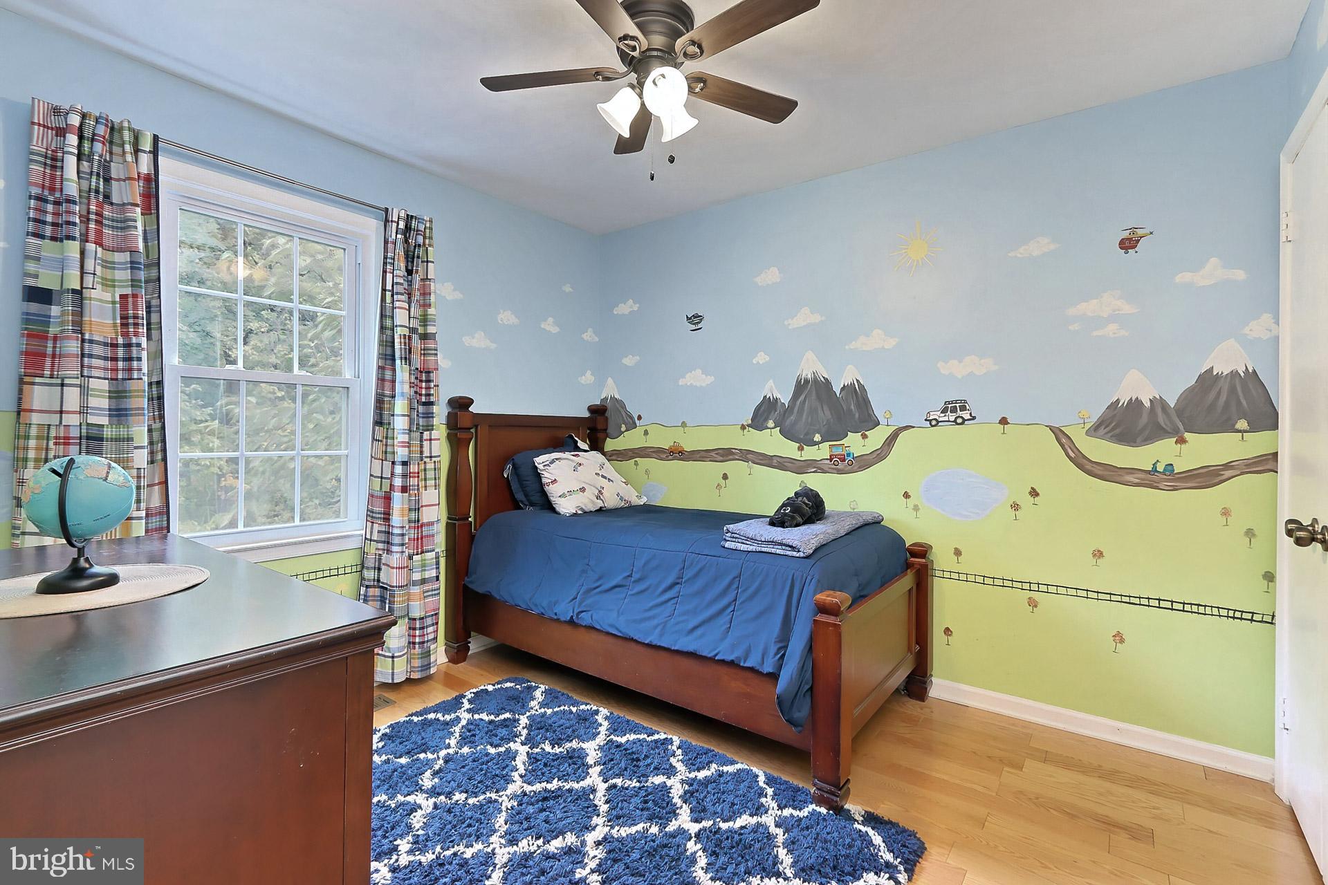 8108 Viola Street Springfield, VA 22152 - Photo 25 of 61 BR 3 with lighted ceiling fan & laminate flooring