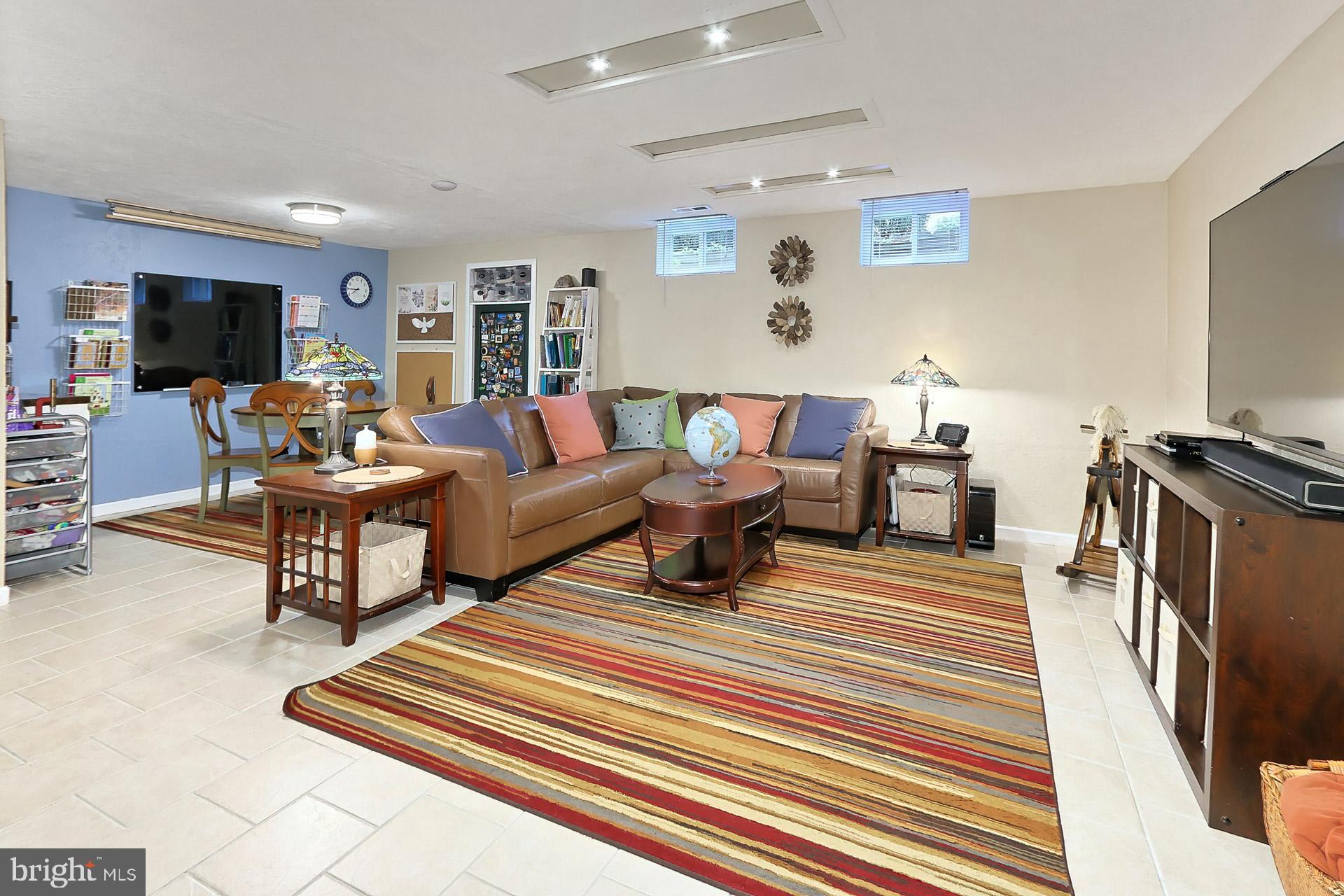 8108 Viola Street Springfield, VA 22152 - Photo 31 of 61 Large LL recreation room w/ceramic tile floors