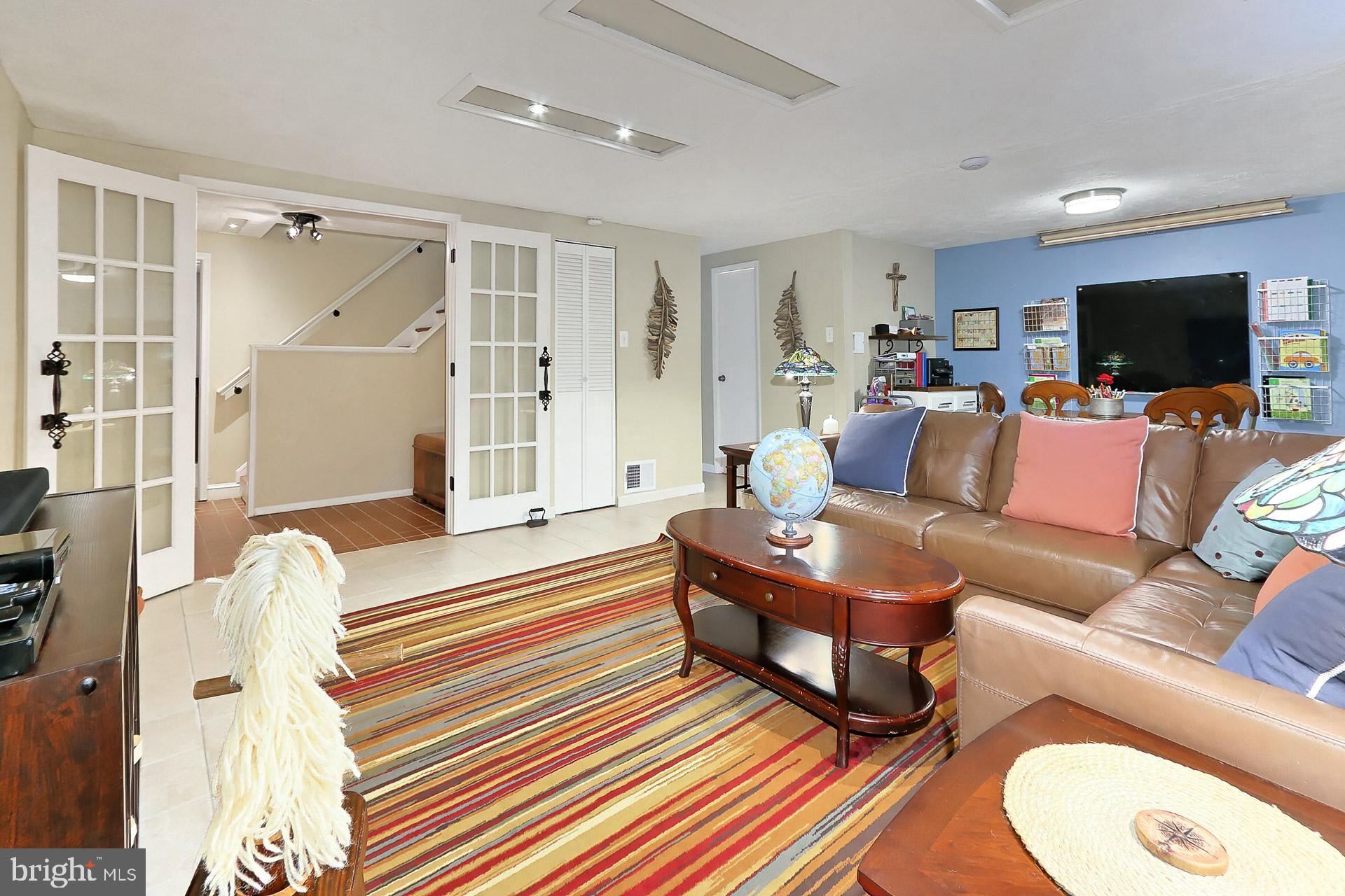 8108 Viola Street Springfield, VA 22152 - Photo 32 of 61 French doors from LL landing to recreation room