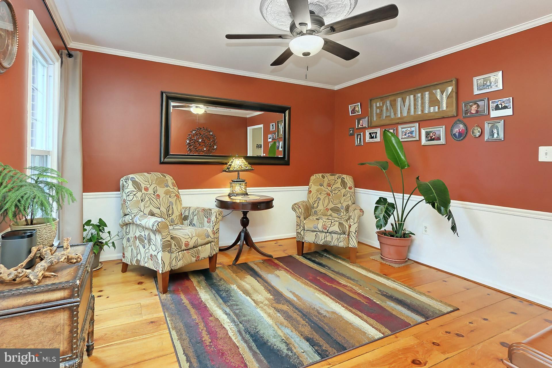 8108 Viola Street Springfield, VA 22152 - Photo 5 of 61 Living rm w/ lighted ceil fan & wide plank floors