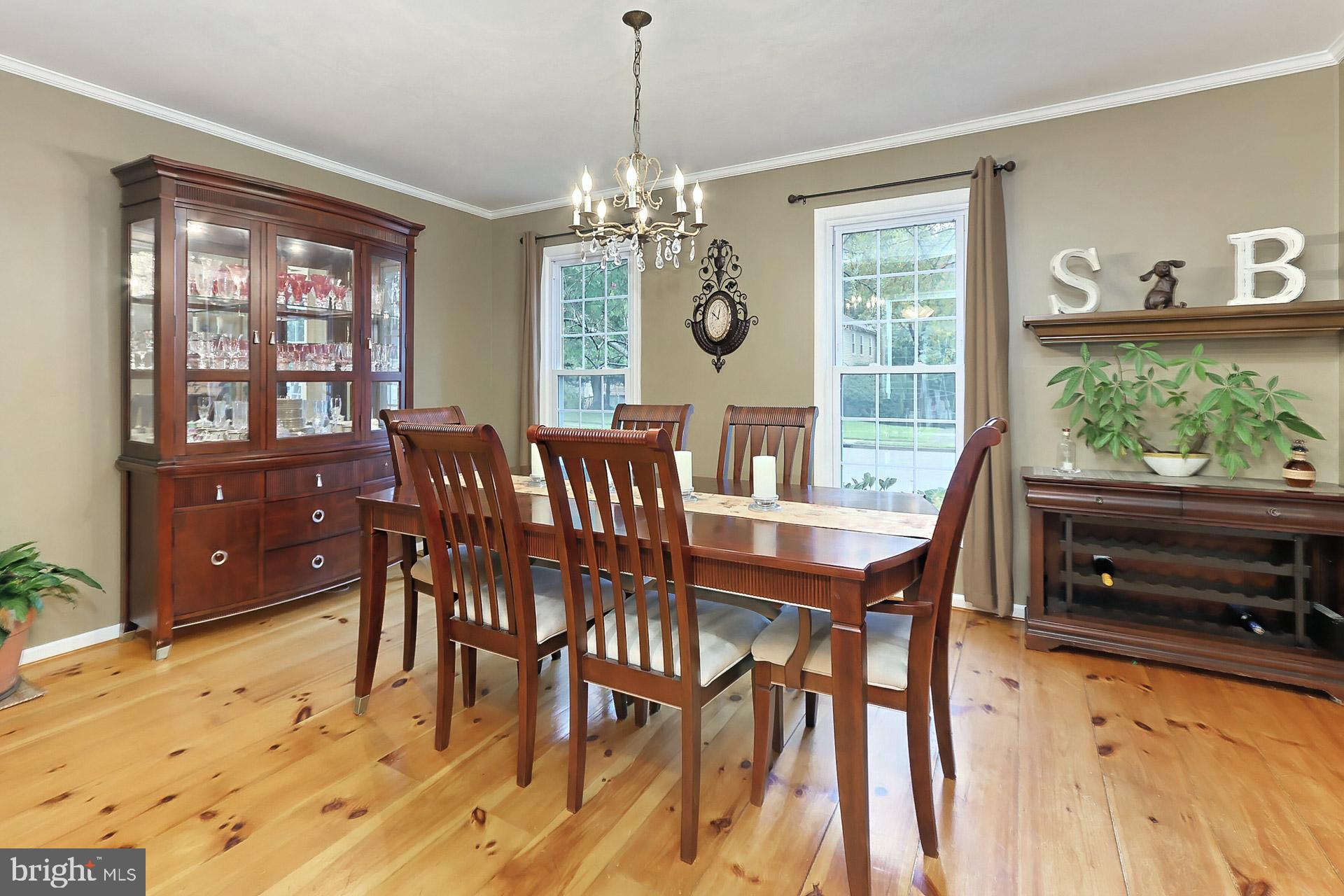 8108 Viola Street Springfield, VA 22152 - Photo 7 of 61 Large dining room features wide-plank wood floors