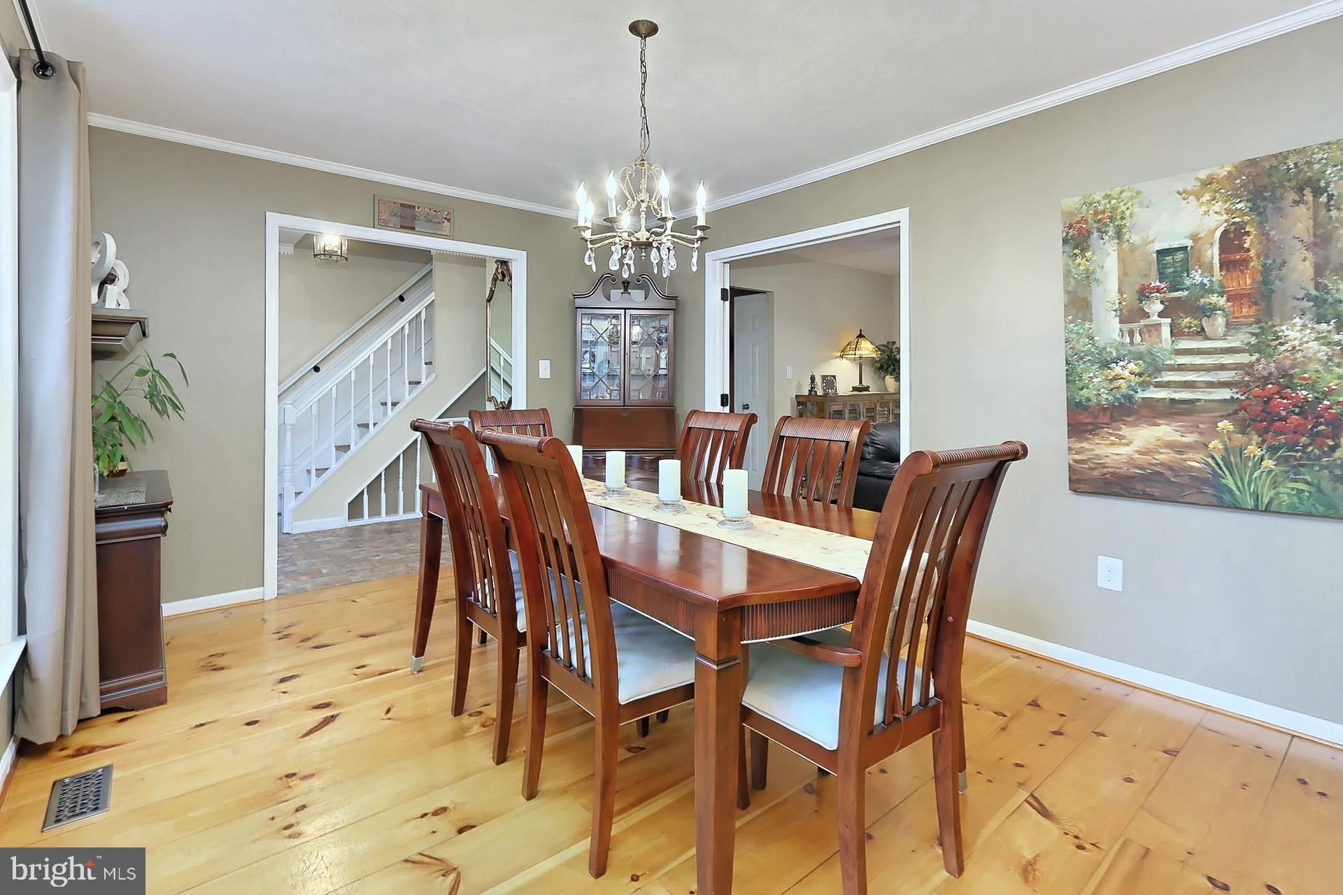 8108 Viola Street Springfield, VA 22152 - Photo 8 of 61 Crown molding and candelabra chandelier