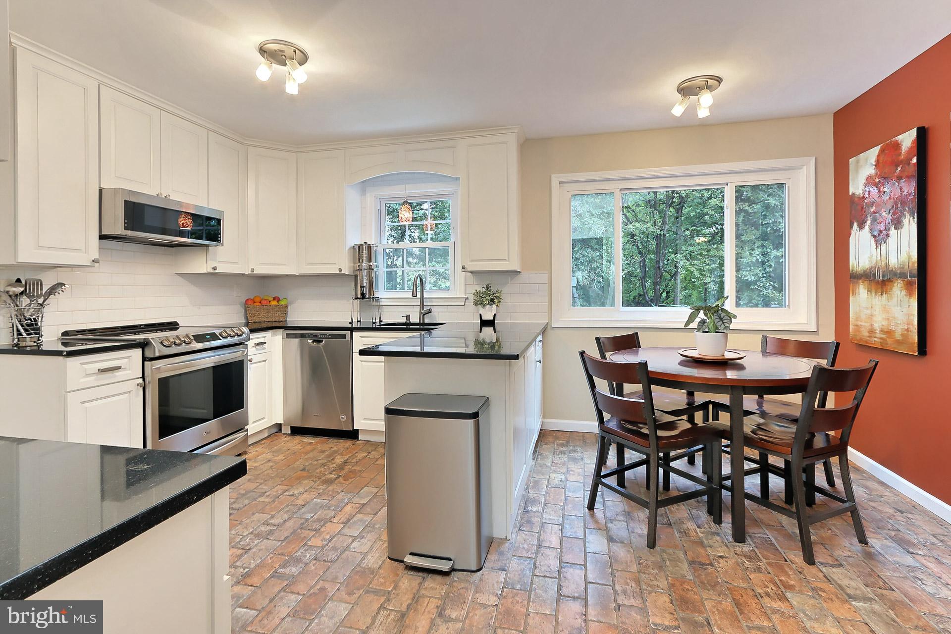 8108 Viola Street Springfield, VA 22152 - Photo 10 of 61 SS appls incl an induction range. Subway tile b/s