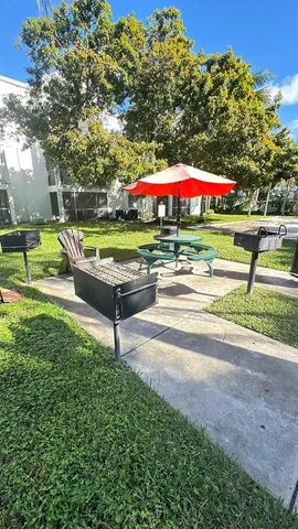 a view of a garden with an outdoor space