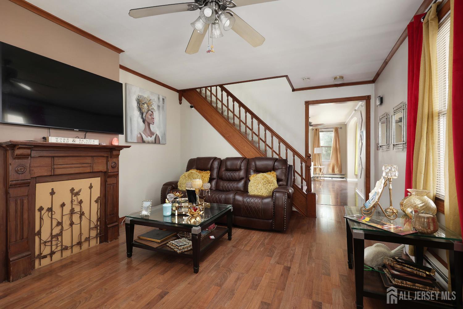 92 Main Street Helmetta, NJ 08828 - Photo 14 of 57 a living room with furniture and a flat screen tv
