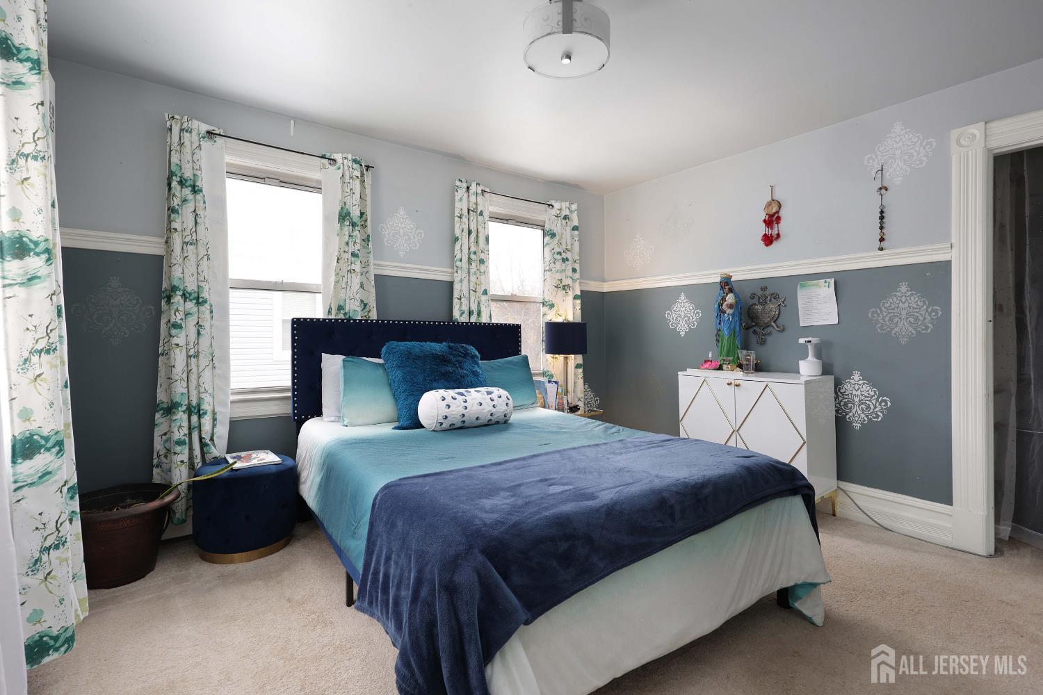 92 Main Street Helmetta, NJ 08828 - Photo 20 of 57 a bedroom with a bed dresser and a window