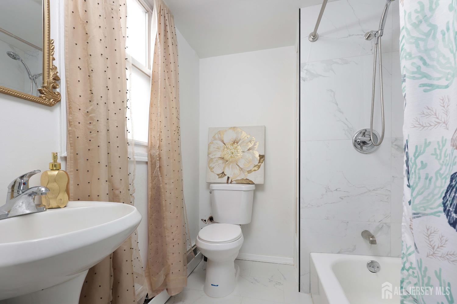92 Main Street Helmetta, NJ 08828 - Photo 24 of 57 a bathroom with a sink toilet and shower