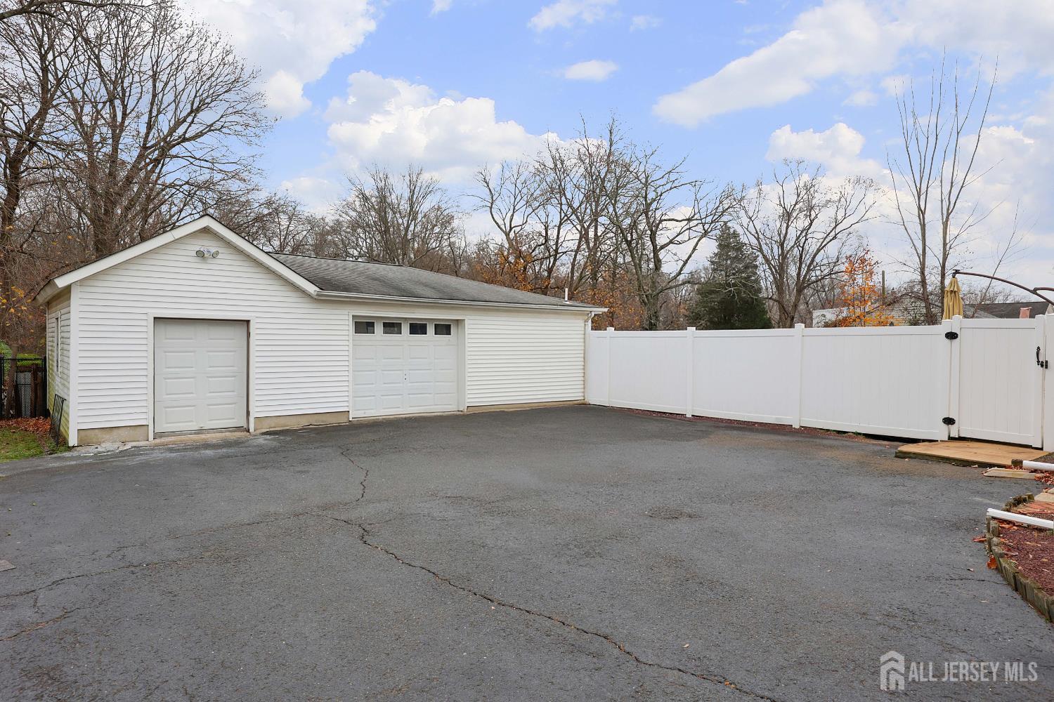 92 Main Street Helmetta, NJ 08828 - Photo 35 of 57 a view of a garage with a house