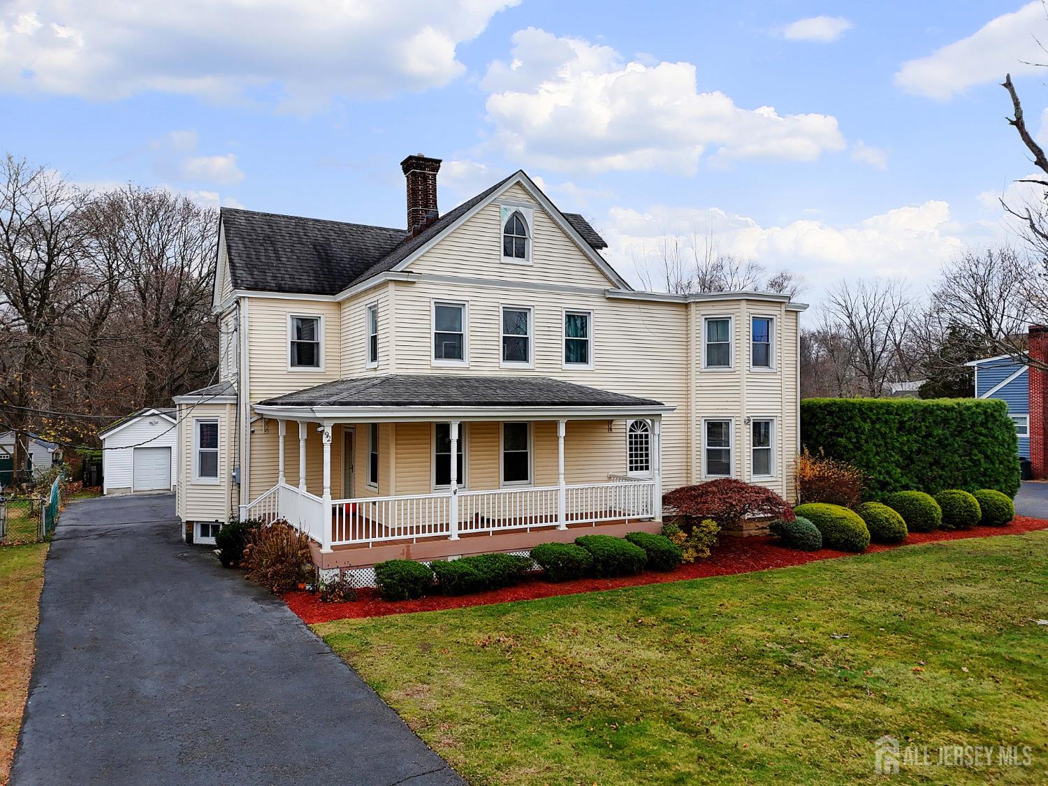 92 Main Street Helmetta, NJ 08828 - Photo 40 of 57 a front view of a house with garden