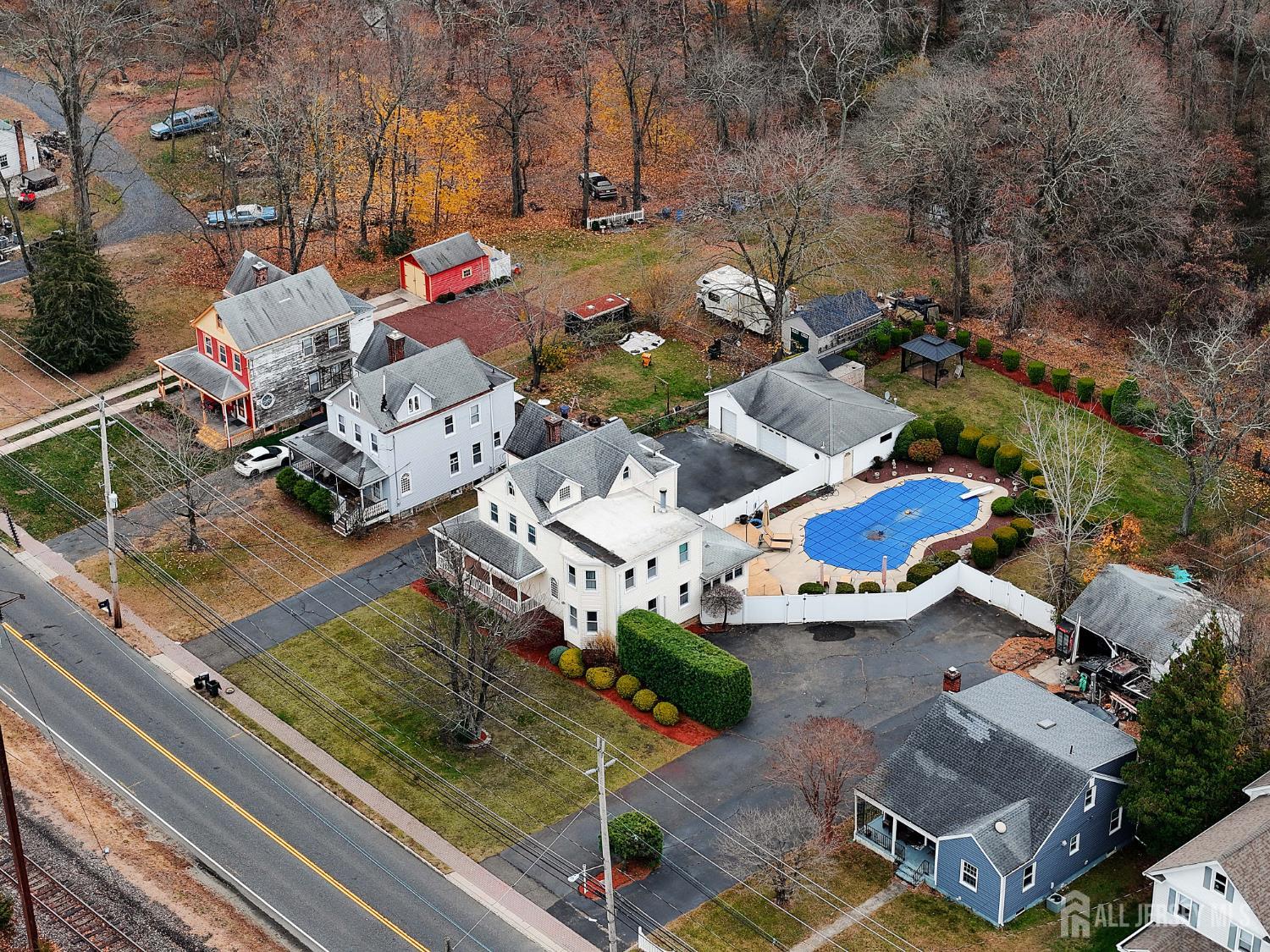 92 Main Street Helmetta, NJ 08828 - Photo 43 of 57 an aerial view of a house with yard basket ball court and outdoor seating