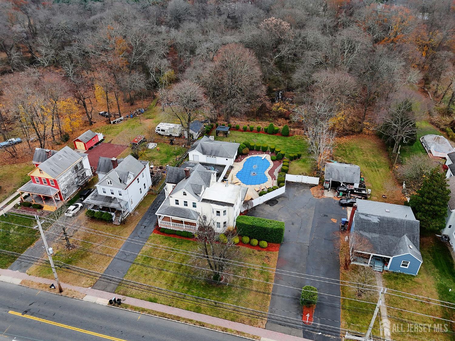 92 Main Street Helmetta, NJ 08828 - Photo 46 of 57 an aerial view of a house with a garden