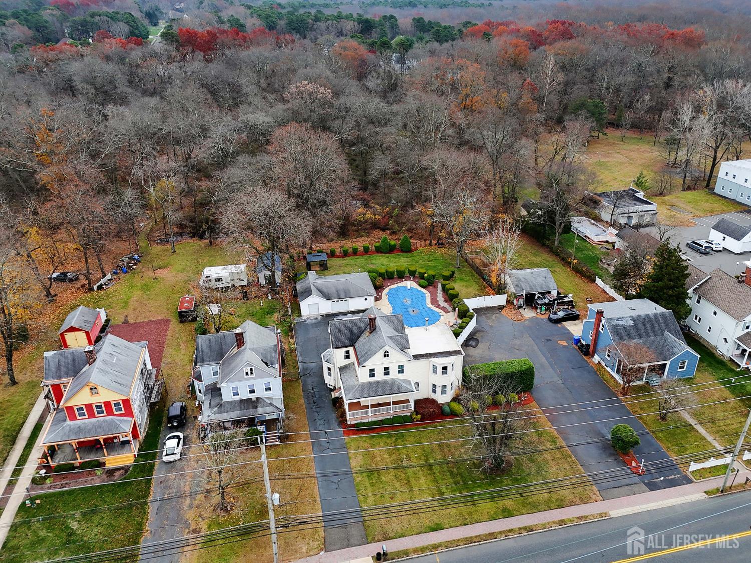 92 Main Street Helmetta, NJ 08828 - Photo 47 of 57 an aerial view of residential houses with outdoor space