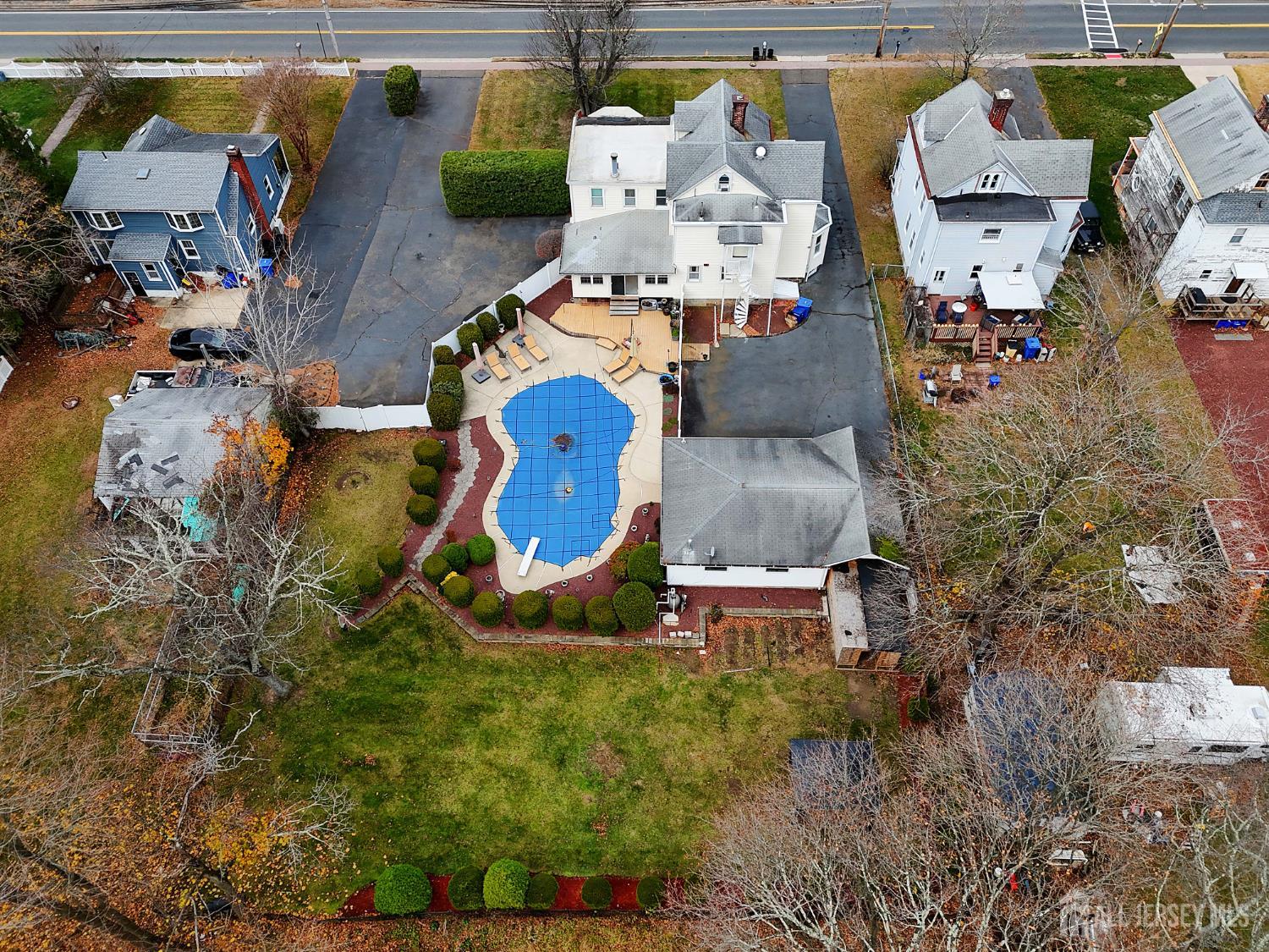 92 Main Street Helmetta, NJ 08828 - Photo 52 of 57 an aerial view of residential houses with outdoor space