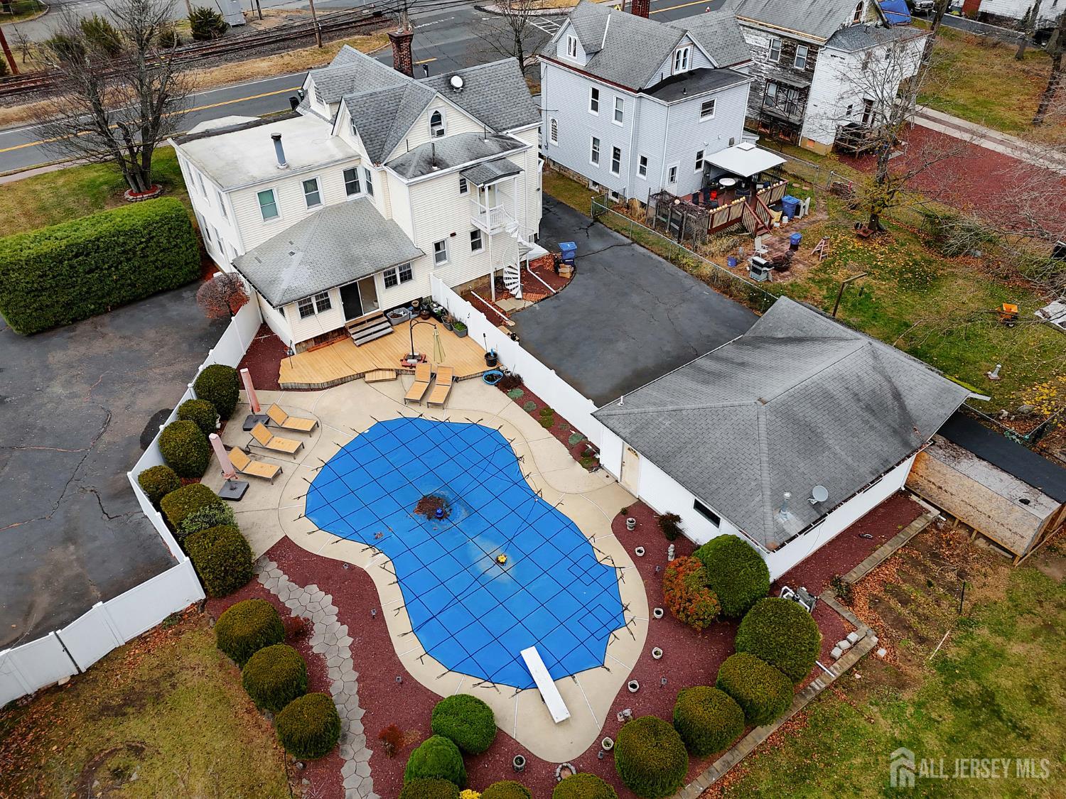 92 Main Street Helmetta, NJ 08828 - Photo 54 of 57 an aerial view of a house with a yard and garden