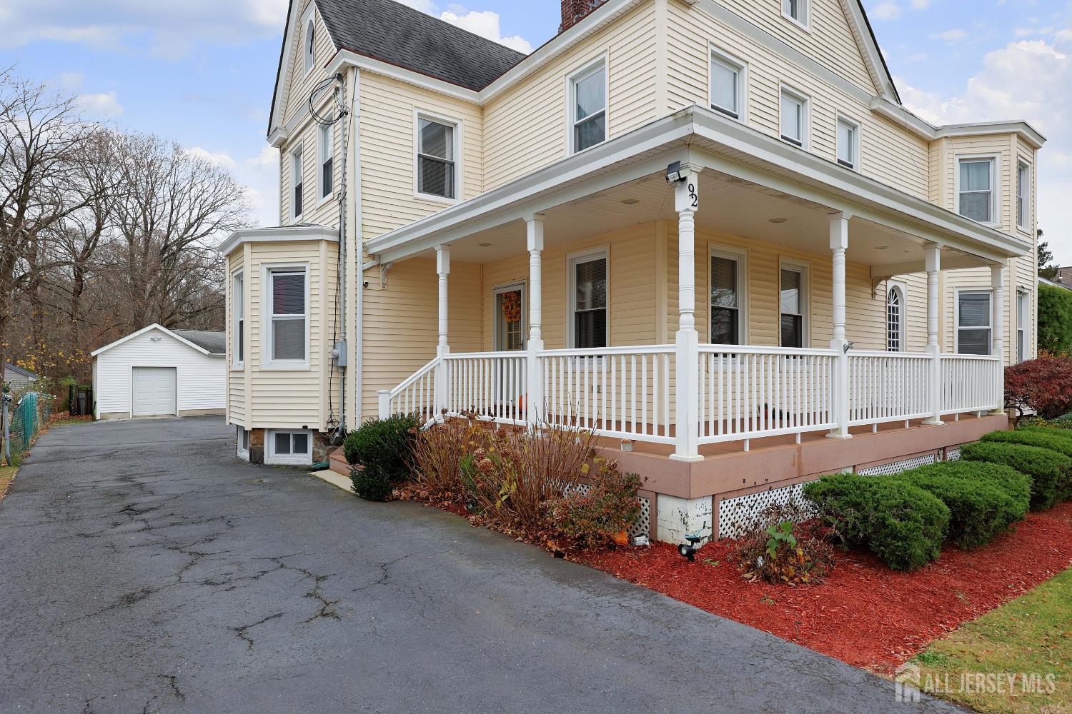 92 Main Street Helmetta, NJ 08828 - Photo 6 of 57 front view of a house with a yard