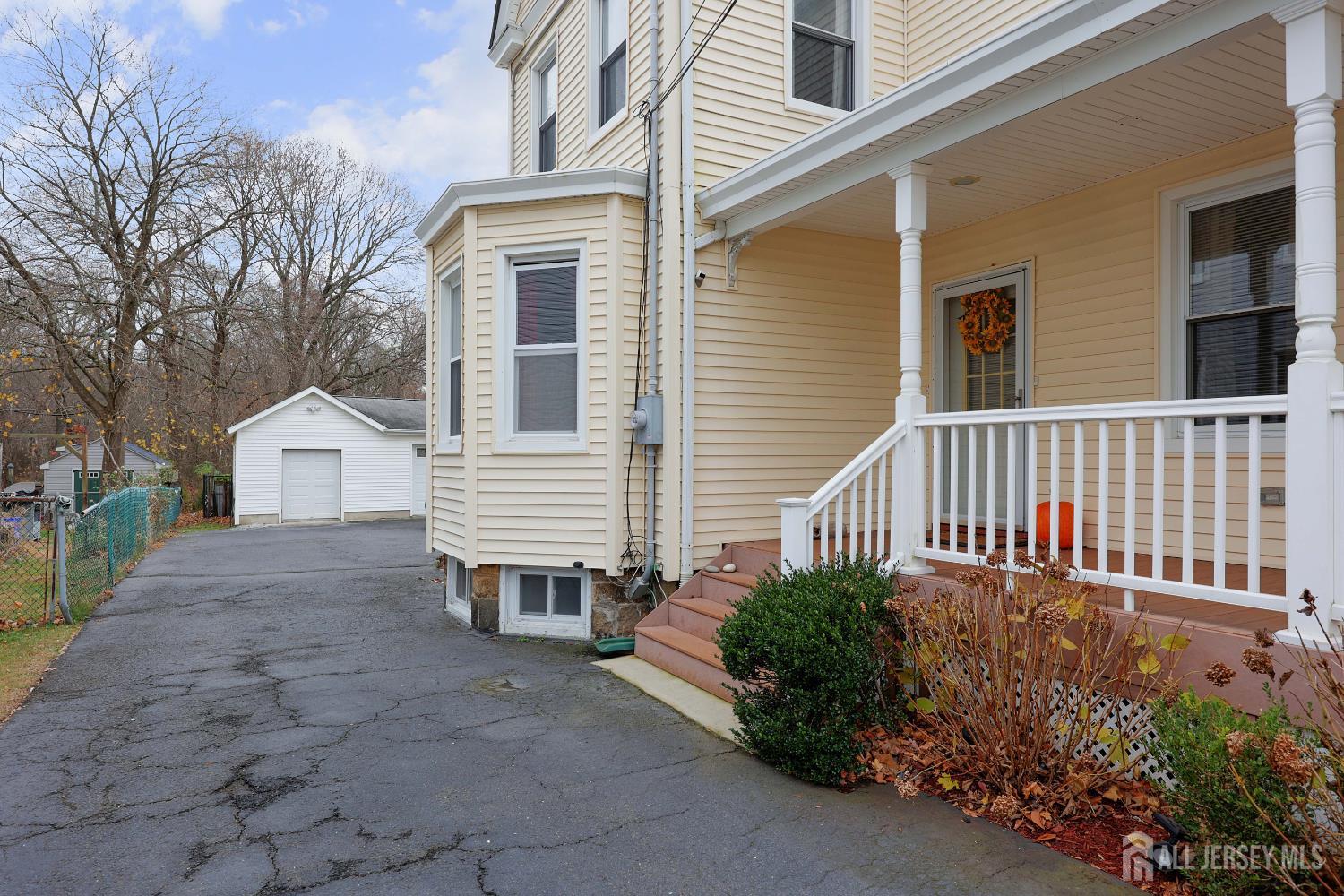 92 Main Street Helmetta, NJ 08828 - Photo 8 of 57 a view of a house with a yard