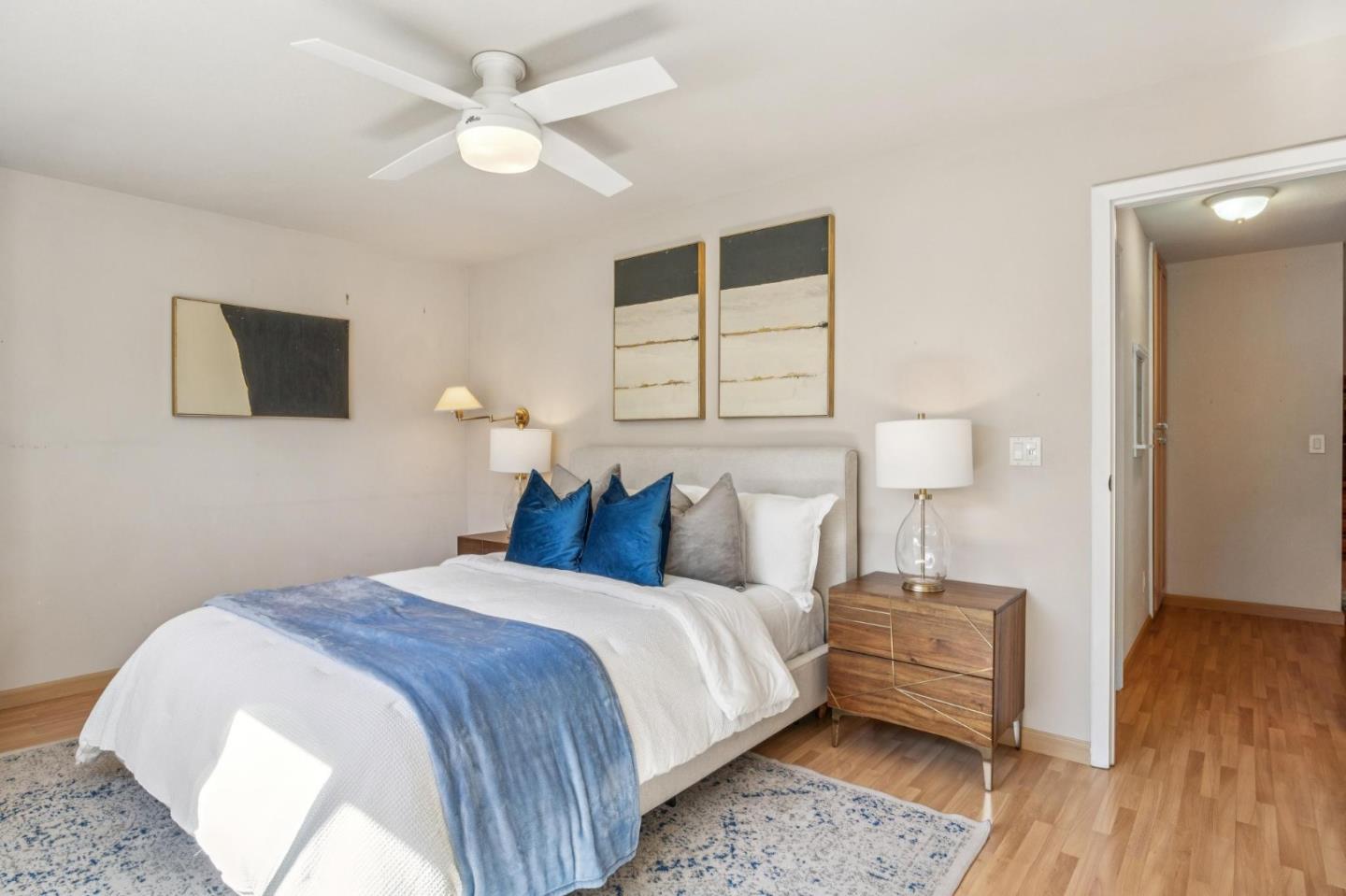 94 Flynn Avenue, Unit D Mountain View, CA 94043 - Photo 11 of 21 a bedroom with a bed and a night stand