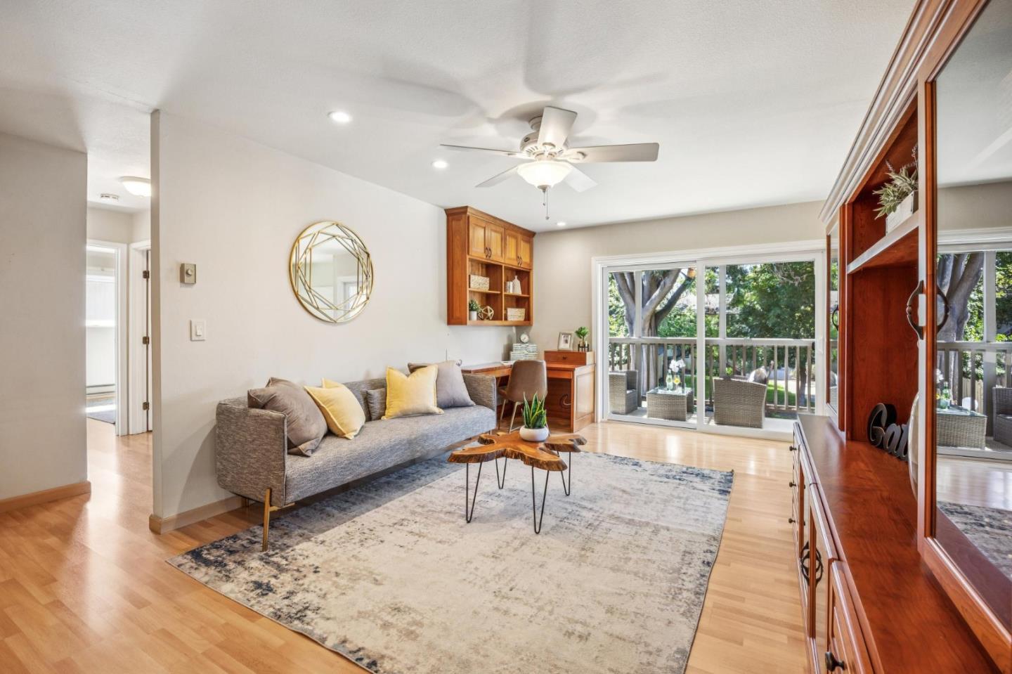 94 Flynn Avenue, Unit D Mountain View, CA 94043 - Photo 7 of 21 a living room with furniture and a large window
