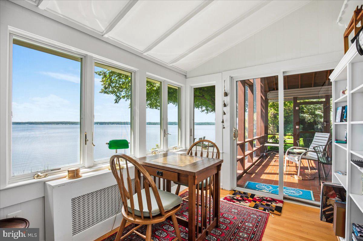 6110 Sheridan Point Road Prince Frederick, MD 20678 - Photo 32 of 77 Serene lakeside sunroom retreat.