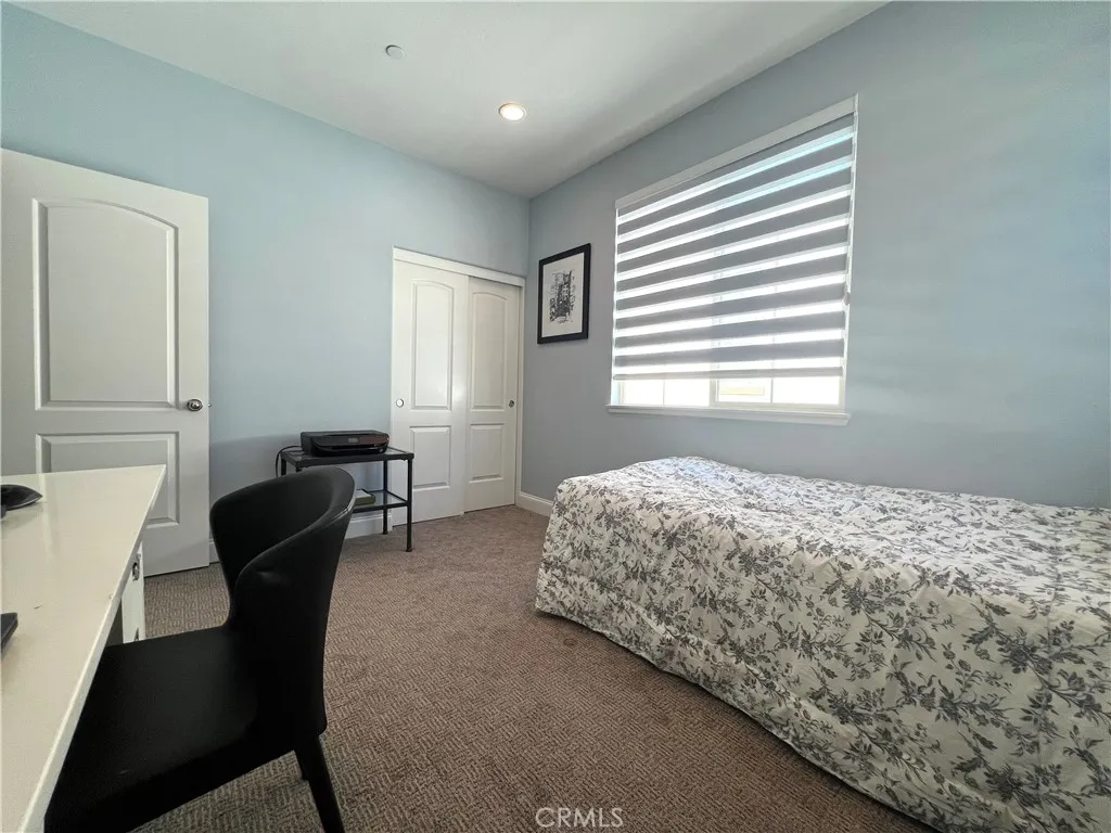 406 Sevilla Drive Brea, CA 92823 - Photo 22 of 33 a bedroom with a bed and a window