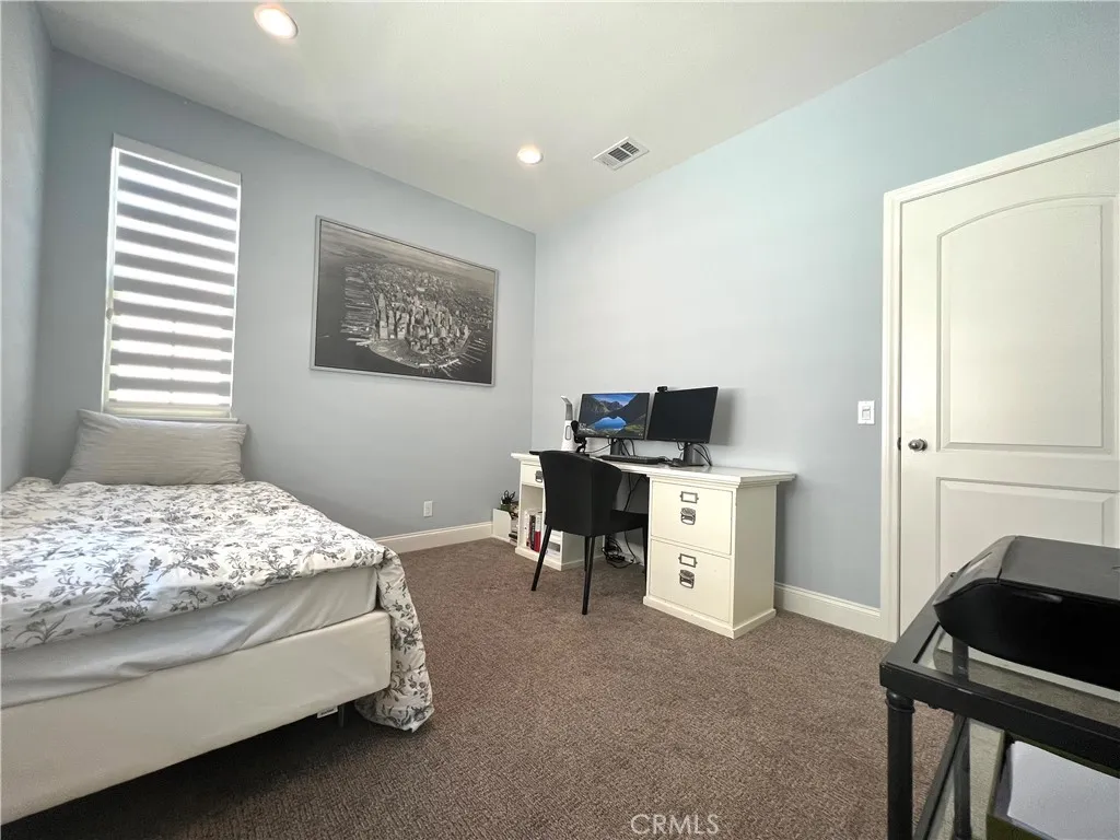 406 Sevilla Drive Brea, CA 92823 - Photo 23 of 33 a bedroom with a bed and a desk