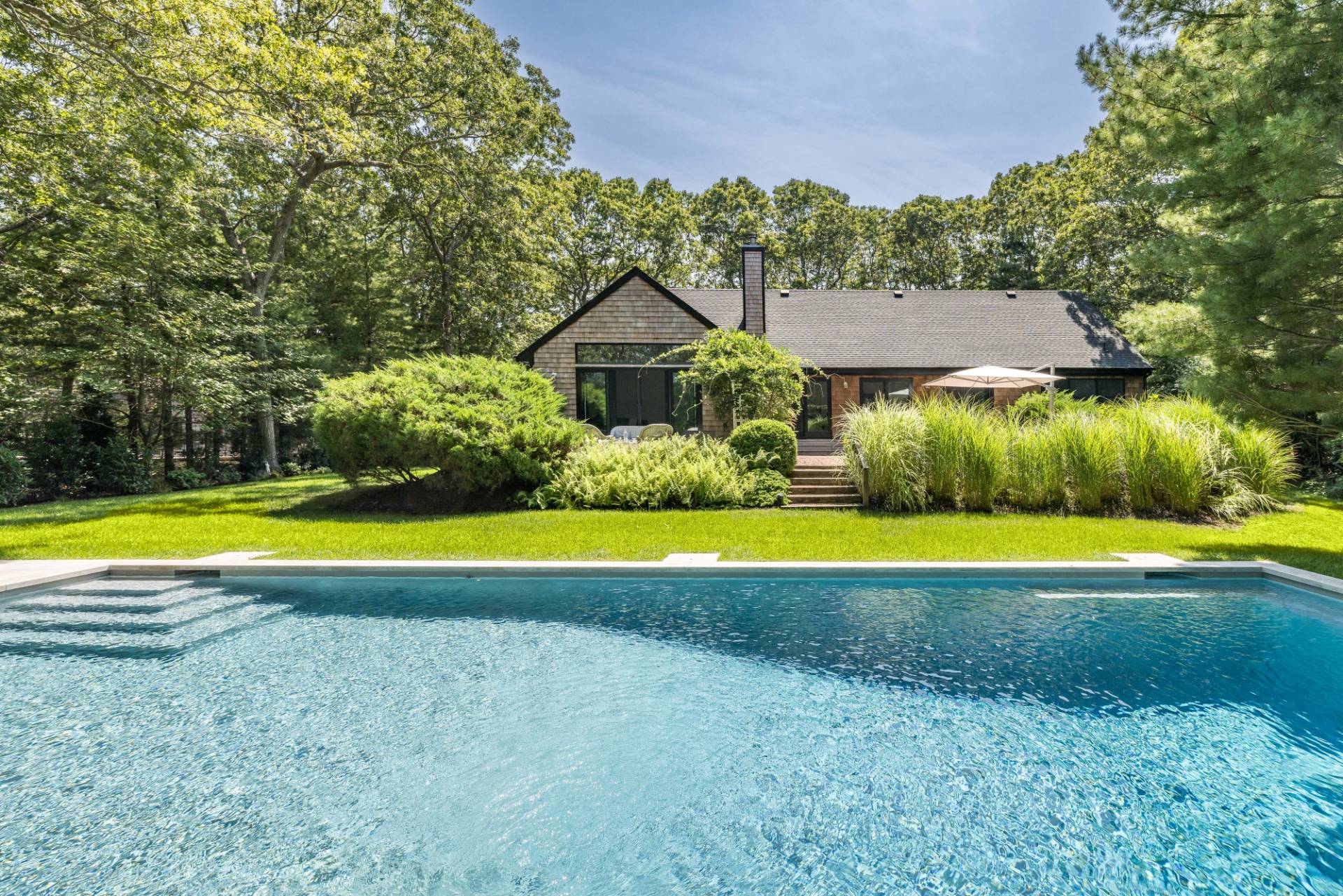 a view of outdoor space yard and swimming pool