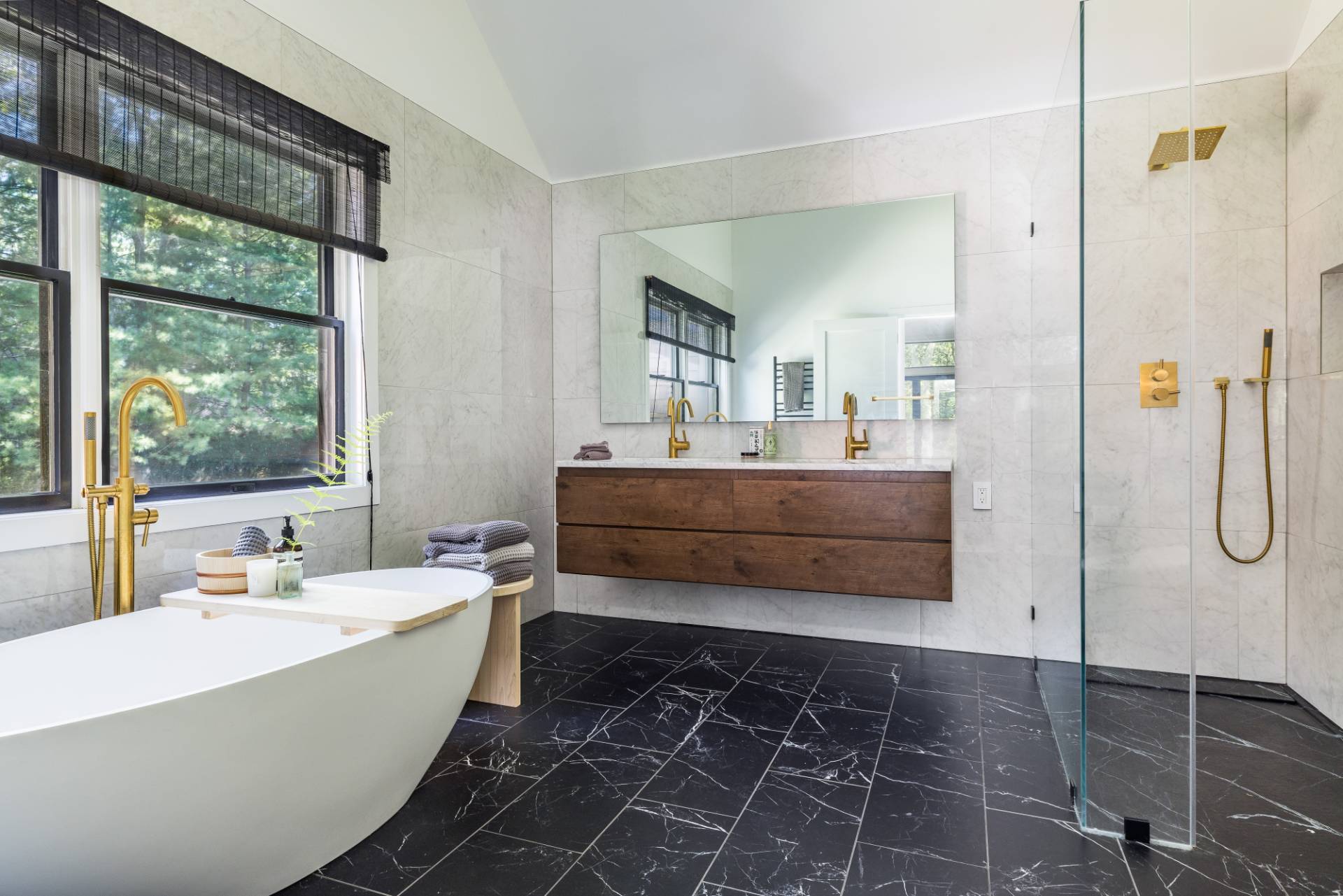 163 Talmage Farm Lane East Hampton, NY 11937 - Photo 13 of 19 a bathroom with a double vanity sink a mirror and a bathtub