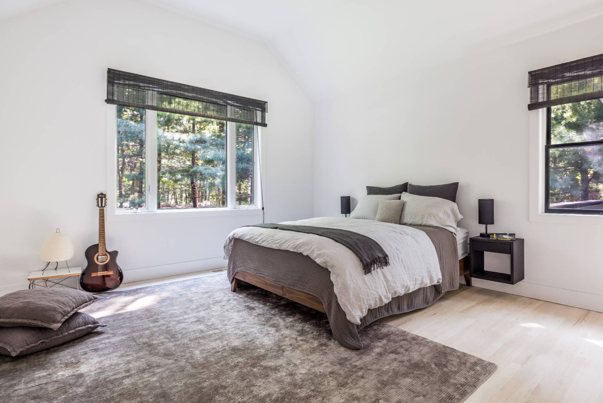 163 Talmage Farm Lane East Hampton, NY 11937 - Photo 15 of 19 a bedroom with a bed and a window