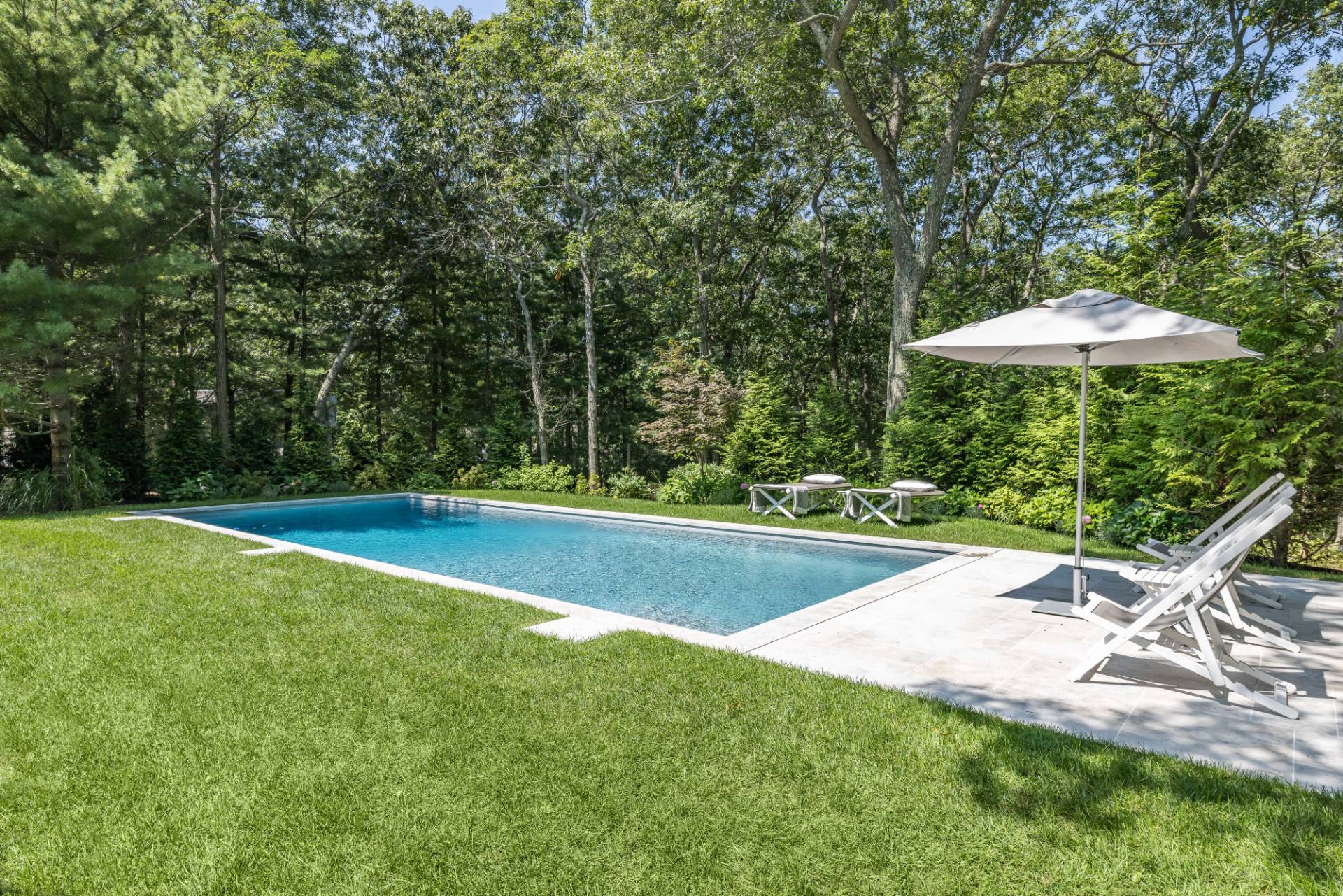 163 Talmage Farm Lane East Hampton, NY 11937 - Photo 4 of 19 a view of a backyard