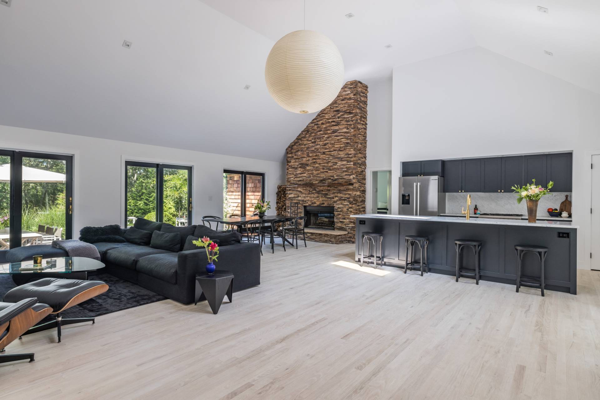 163 Talmage Farm Lane East Hampton, NY 11937 - Photo 8 of 19 a living room with furniture and a wooden floor