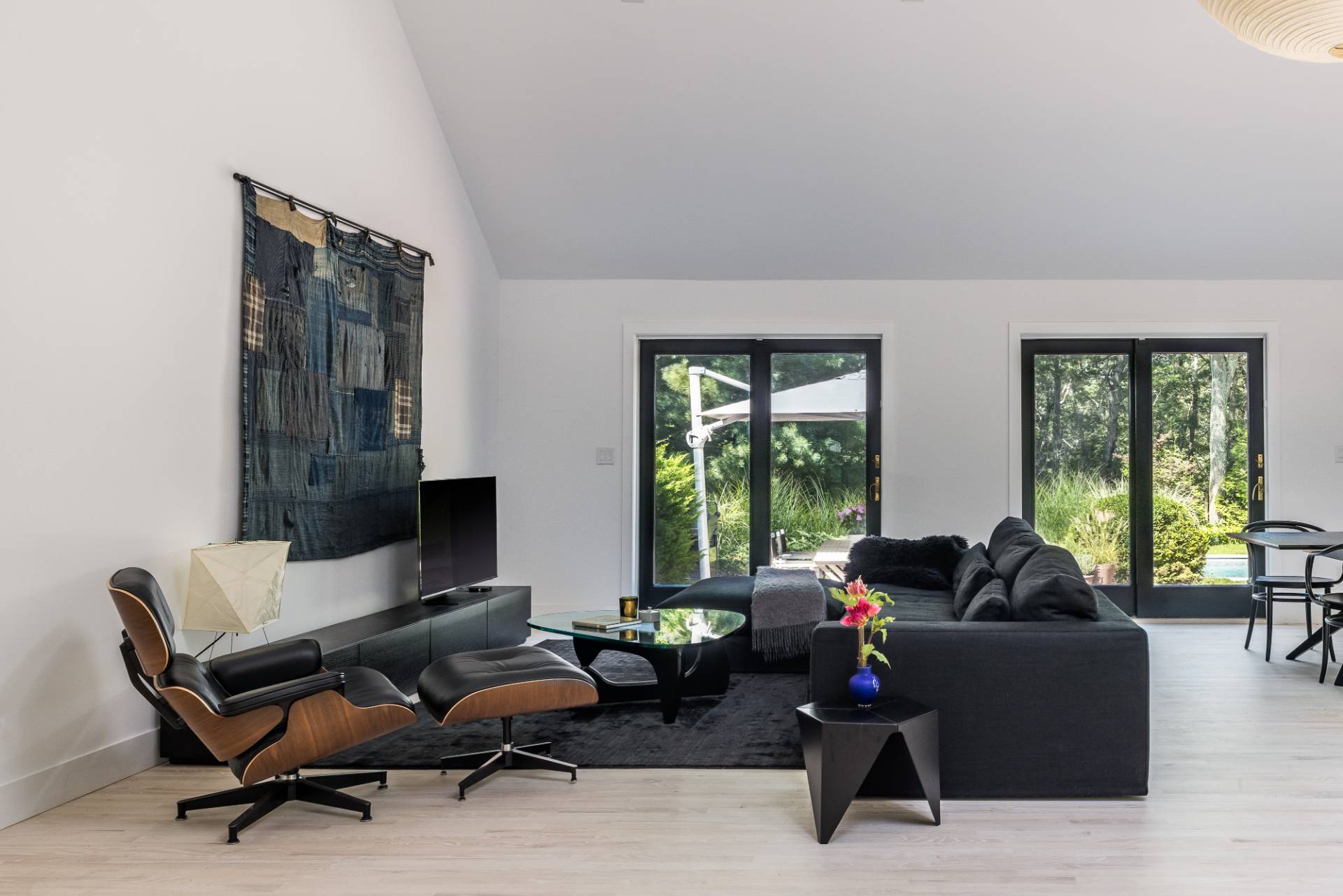 163 Talmage Farm Lane East Hampton, NY 11937 - Photo 9 of 19 a living room with furniture and a large window
