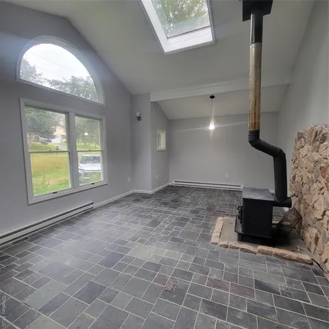 a view of an empty room and window