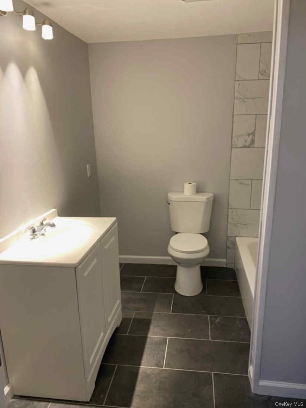 21 Browns Road Livingston Manor, NY 12758 - Photo 21 of 28 a bathroom with a sink toilet and a mirror