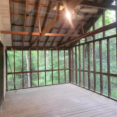 a view of porch with green space