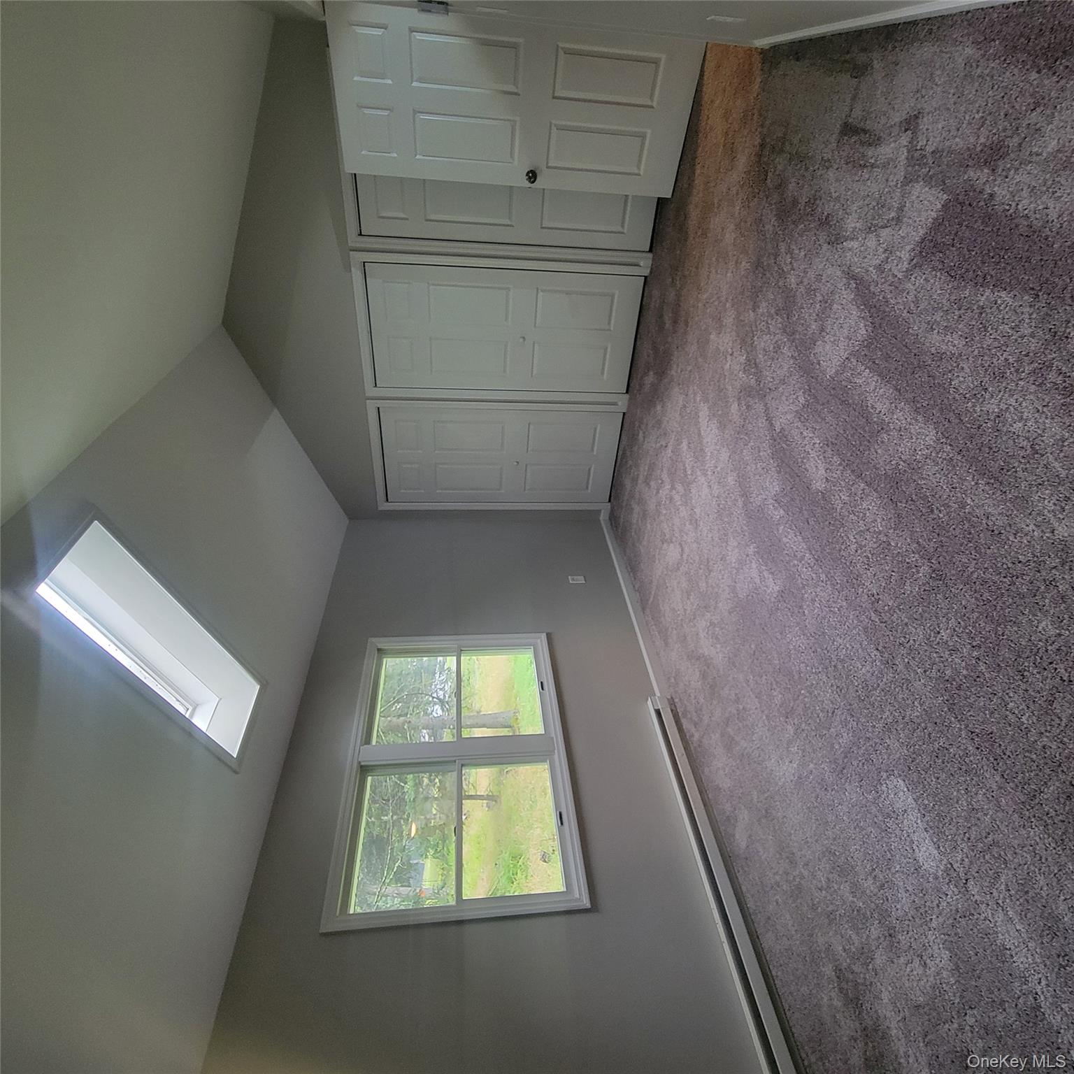 21 Browns Road Livingston Manor, NY 12758 - Photo 3 of 28 an empty room with windows